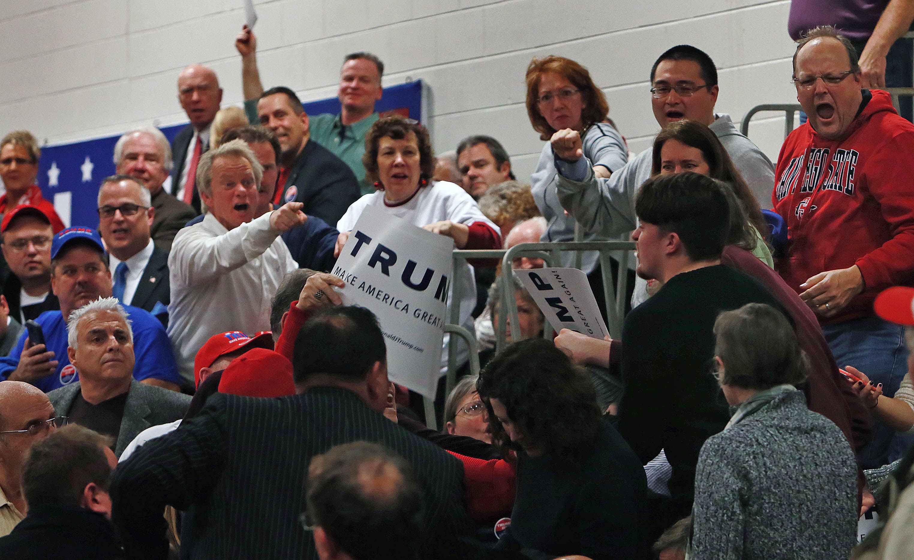 One man tried to heckle Trump during his speech, calling him a fascist. Trump supporters shouted down the man, and he was escorted out of the gymnasium by police.
