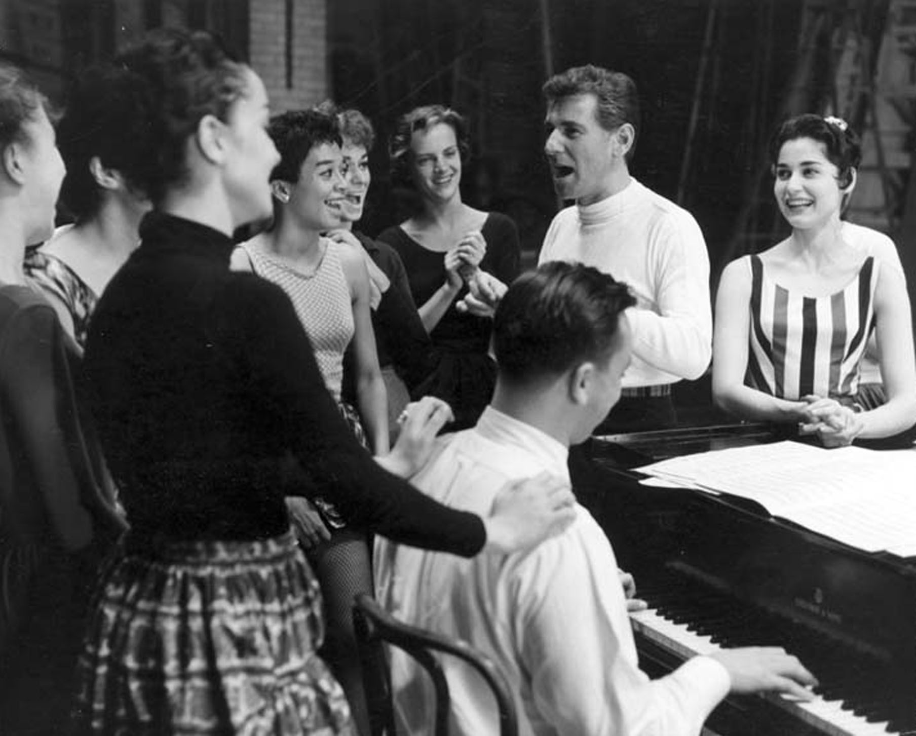 In 1957, Leonard Bernstein and Stephen Sondheim (at piano) rehearsing the Broadway musical “West Side Story.” Carol Lawrence (far right) played Maria.