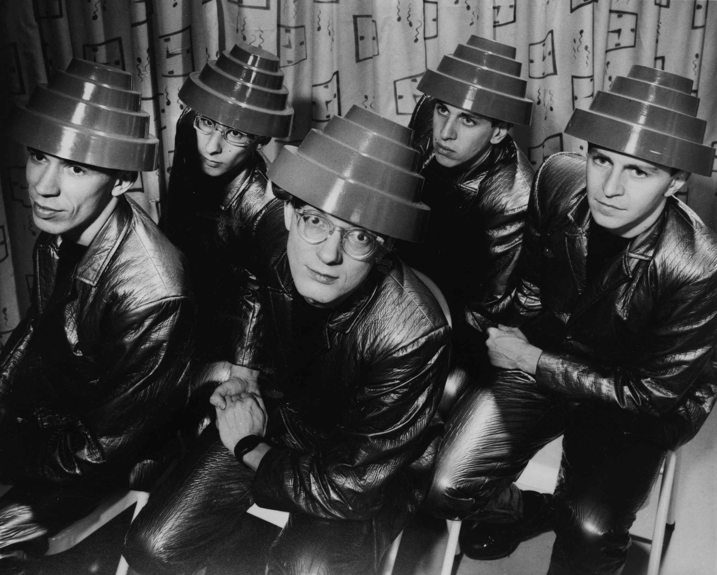 Devo (left to righ): Robert Mothersbaugh, Alan Myers, Mark Mothersbaugh, Robert Casale, Gerald V. Casale.