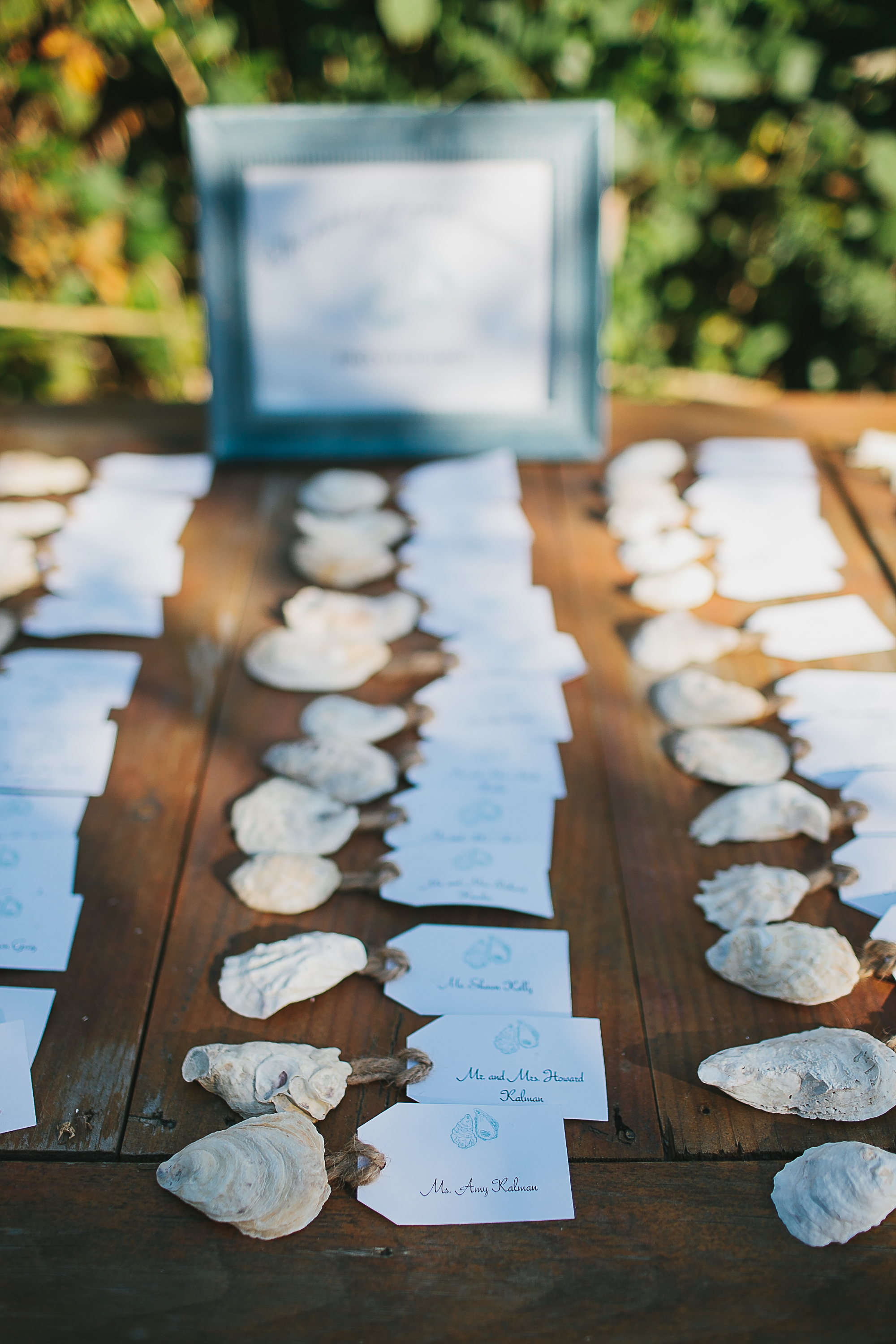 Shells anchor place cards.
