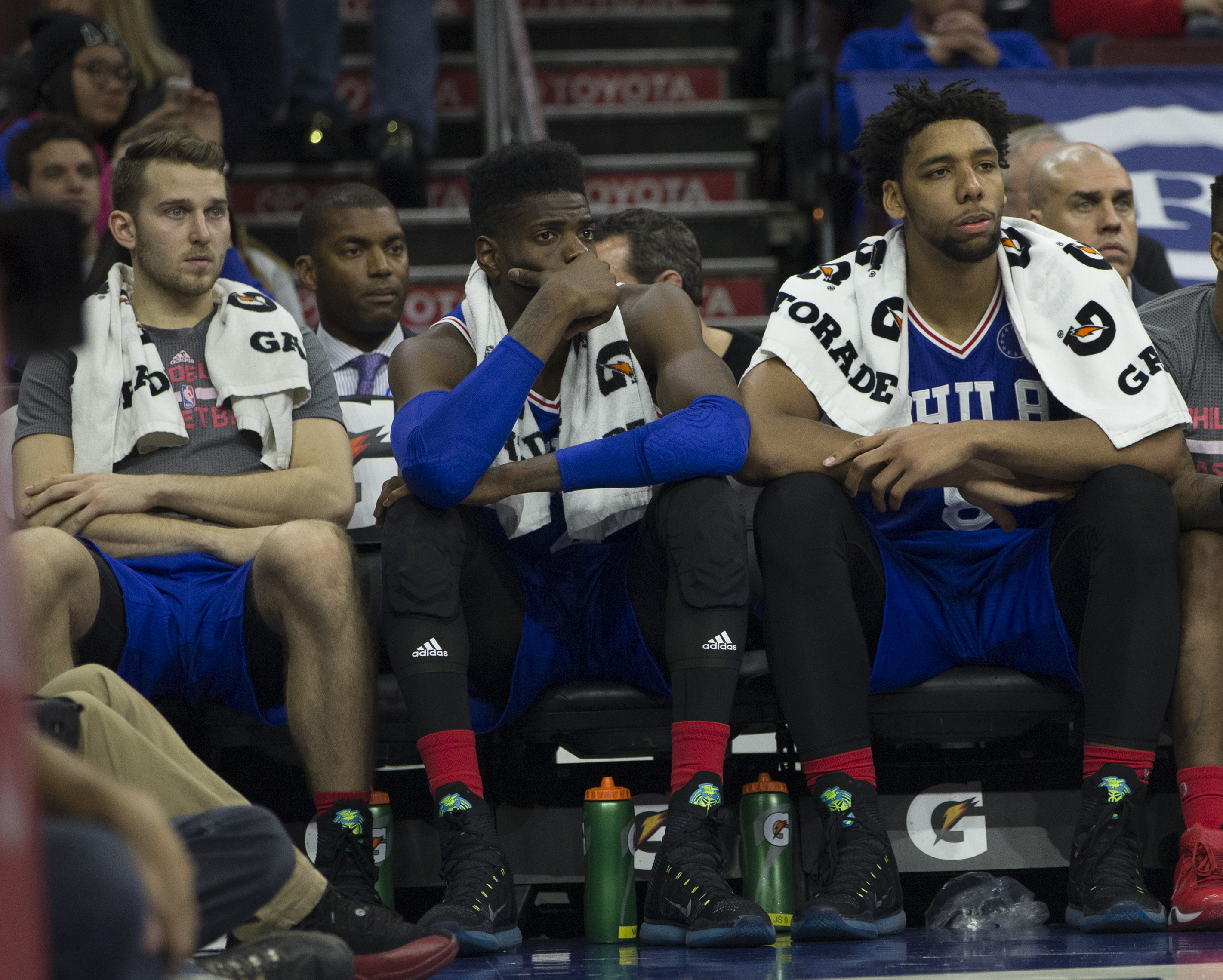 Nik Stauskas (left), Nerlens Noel (center) and Jahlil Okafor are bright spots on an otherwise lackluster Philadelphia roster.