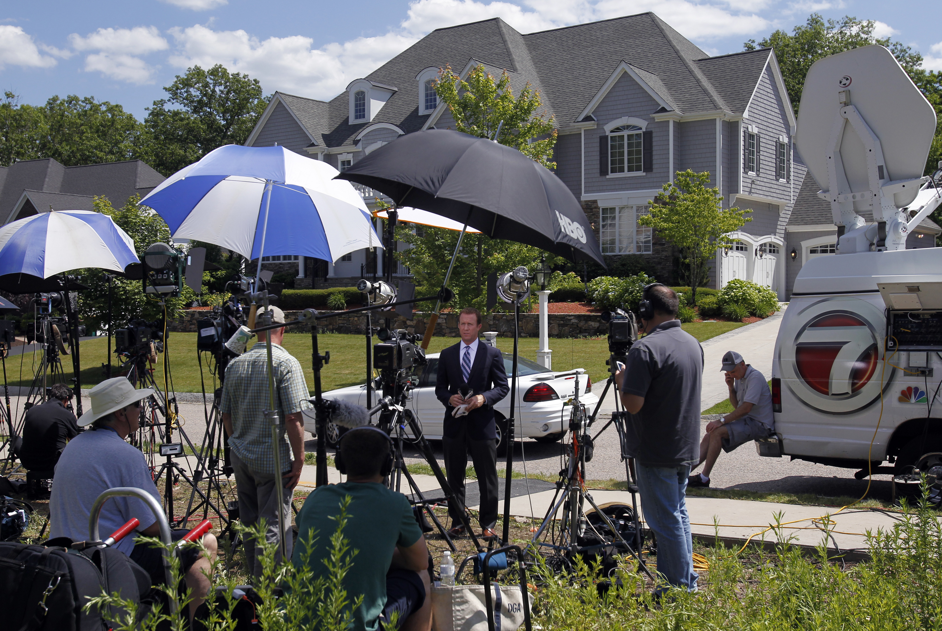 Reporters gathered across the street from the North Attleborough home of Aaron Hernandez.