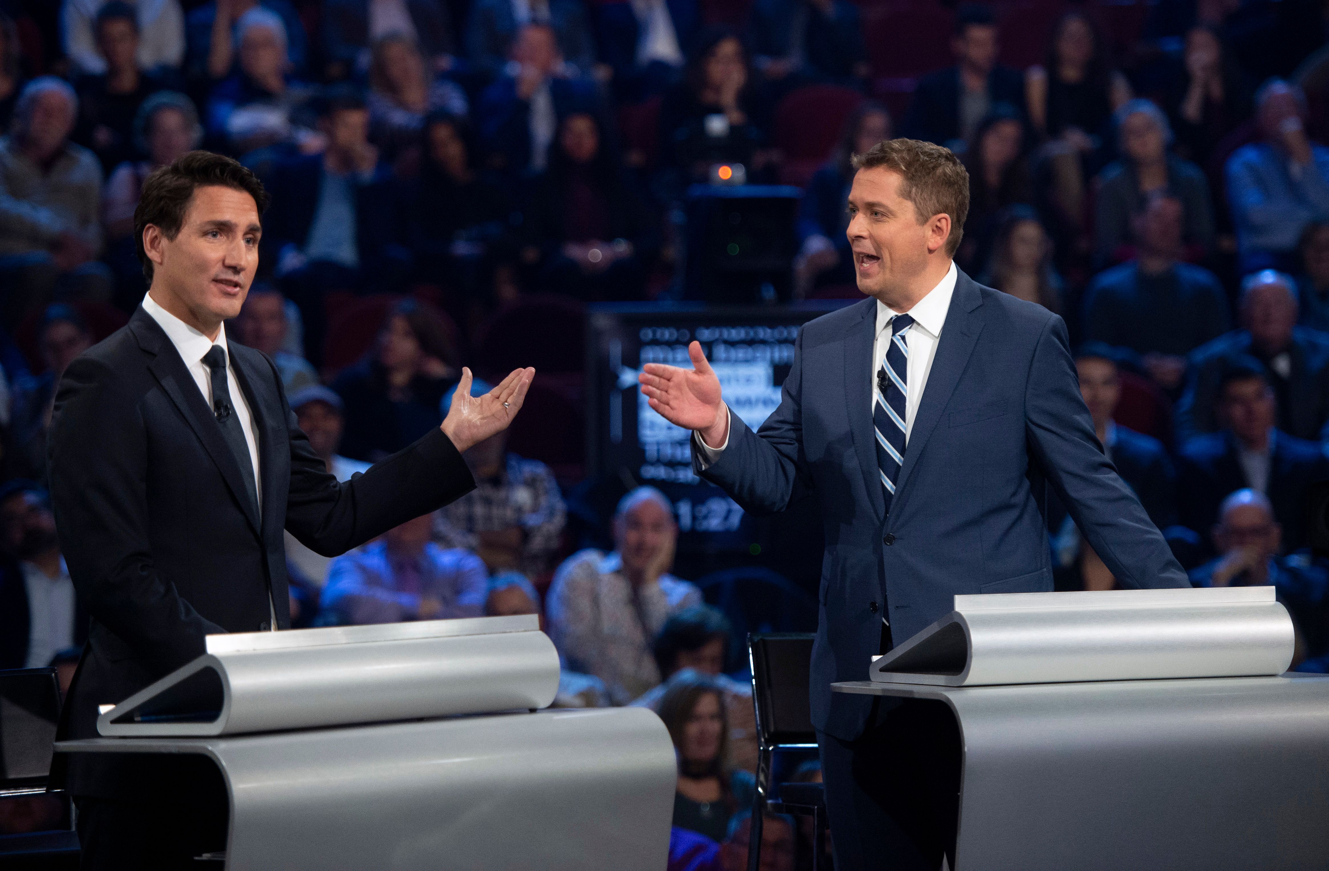 Trudeau (left) and Conservative Party leader Andrew Scheer debated earlier this month in Quebec.