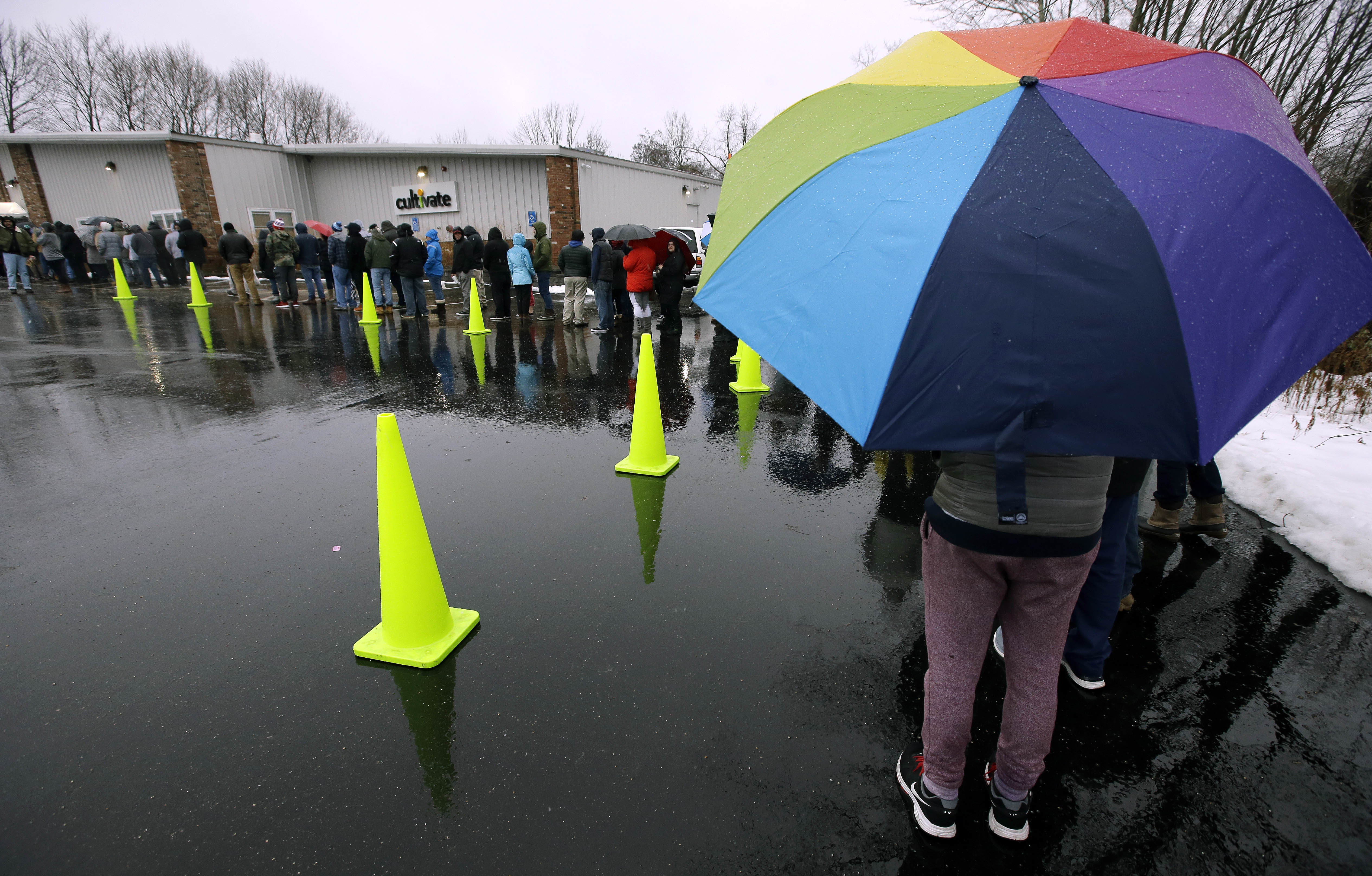 Customers lined up outside the Cultivate dispensary.