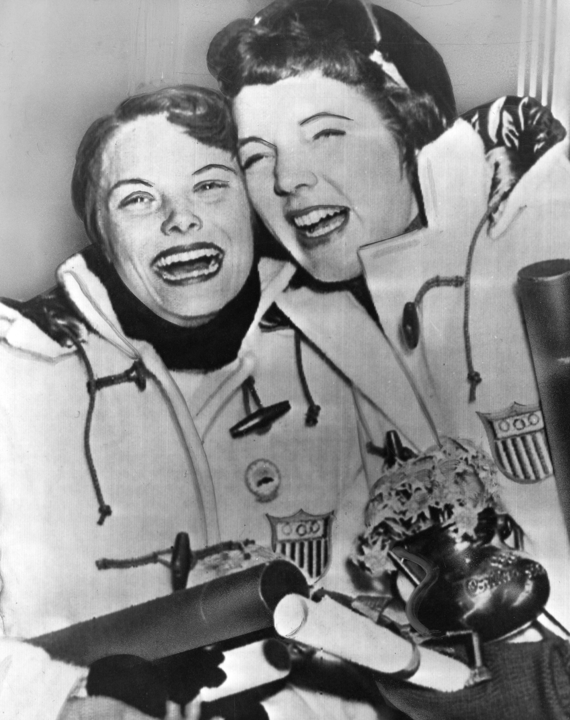 Albright and silver medalist Carol Heiss in Cortina, Italy, after receiving their medals.