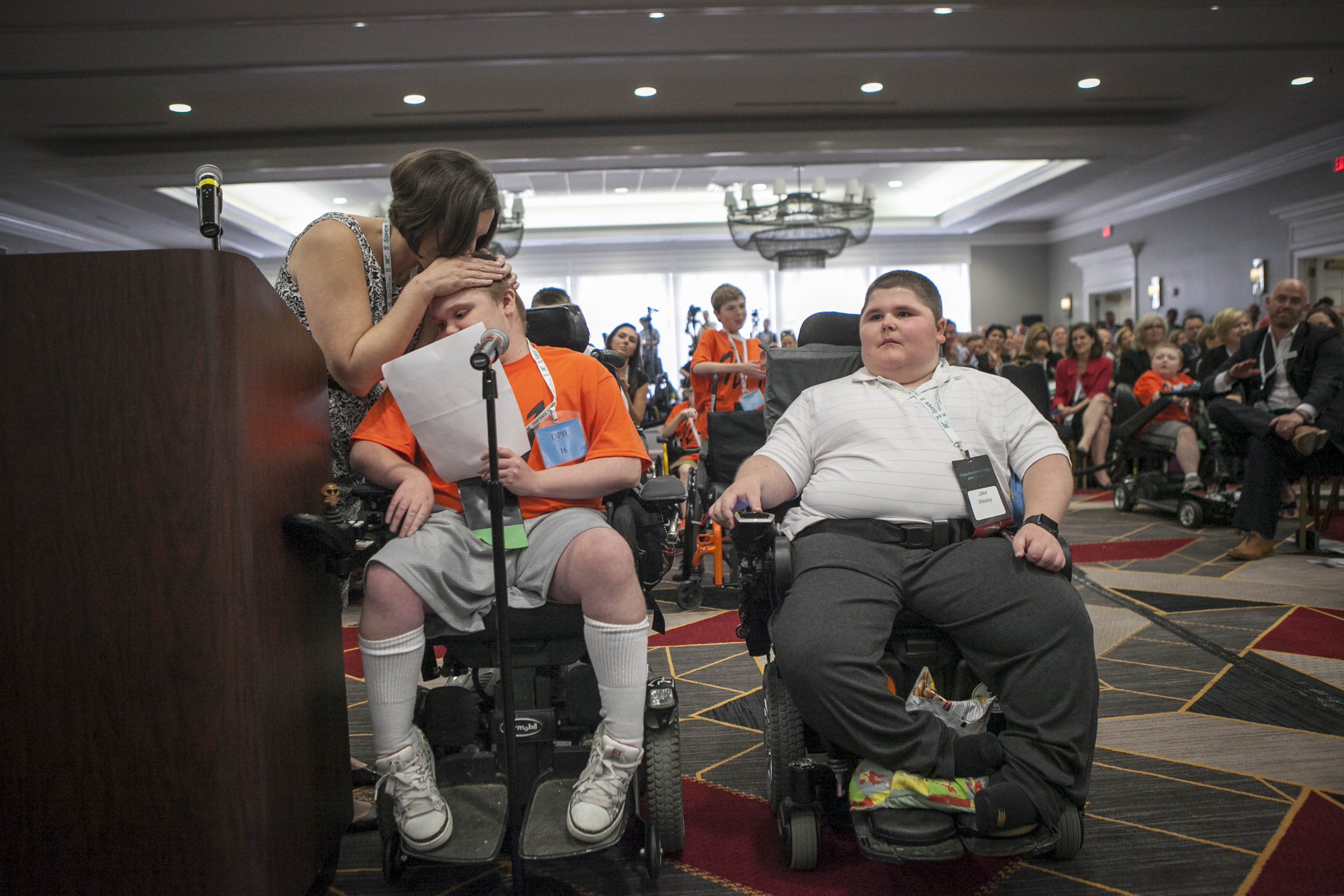 Jenn McNary kissed Austin Leclaire after he spoke during hearings over conflicting interpretations of findings from Sarepta’s clinical trial of its Duchenne muscular dystrophy drug.