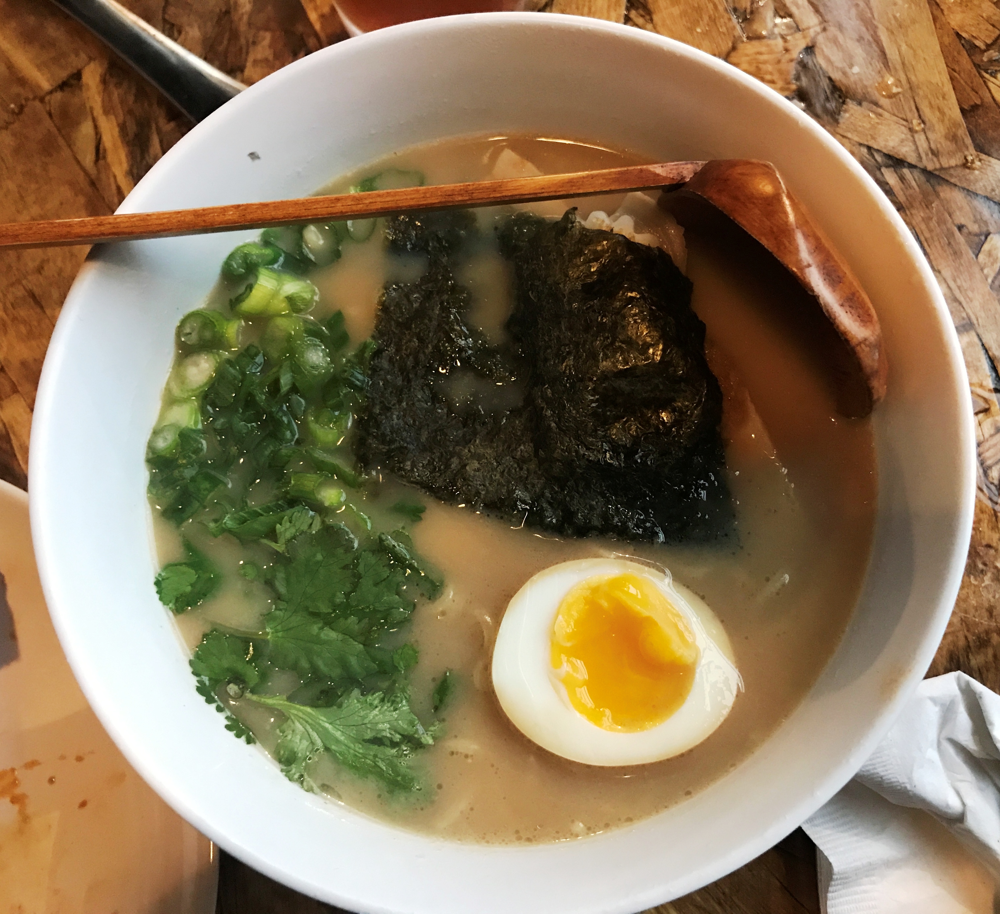 Slow-roasted pork-belly ramen with soft egg, a sort of bacon-and-egg soup.