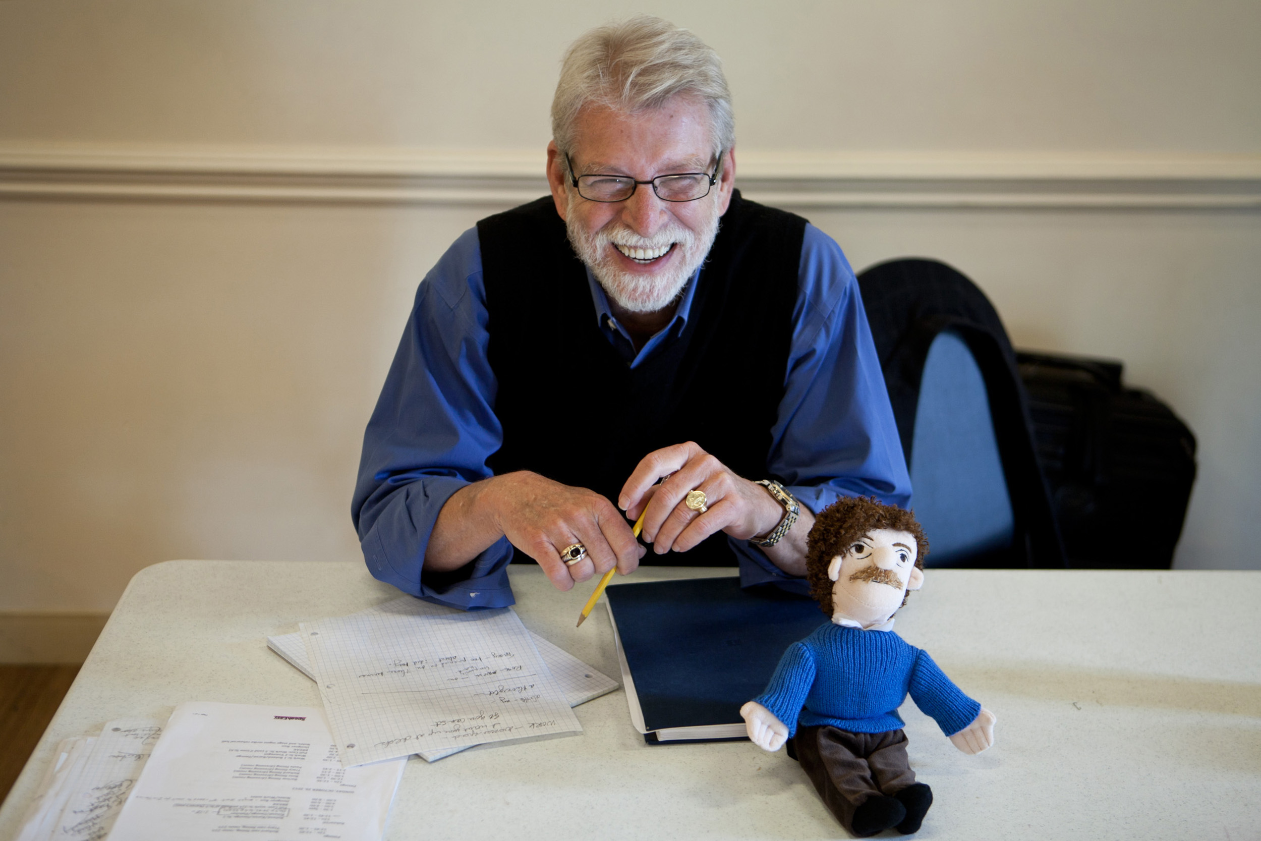 Director Cliff Fannin Baker, with a Kurt Vonnegut doll, at a rehearsal for the play.