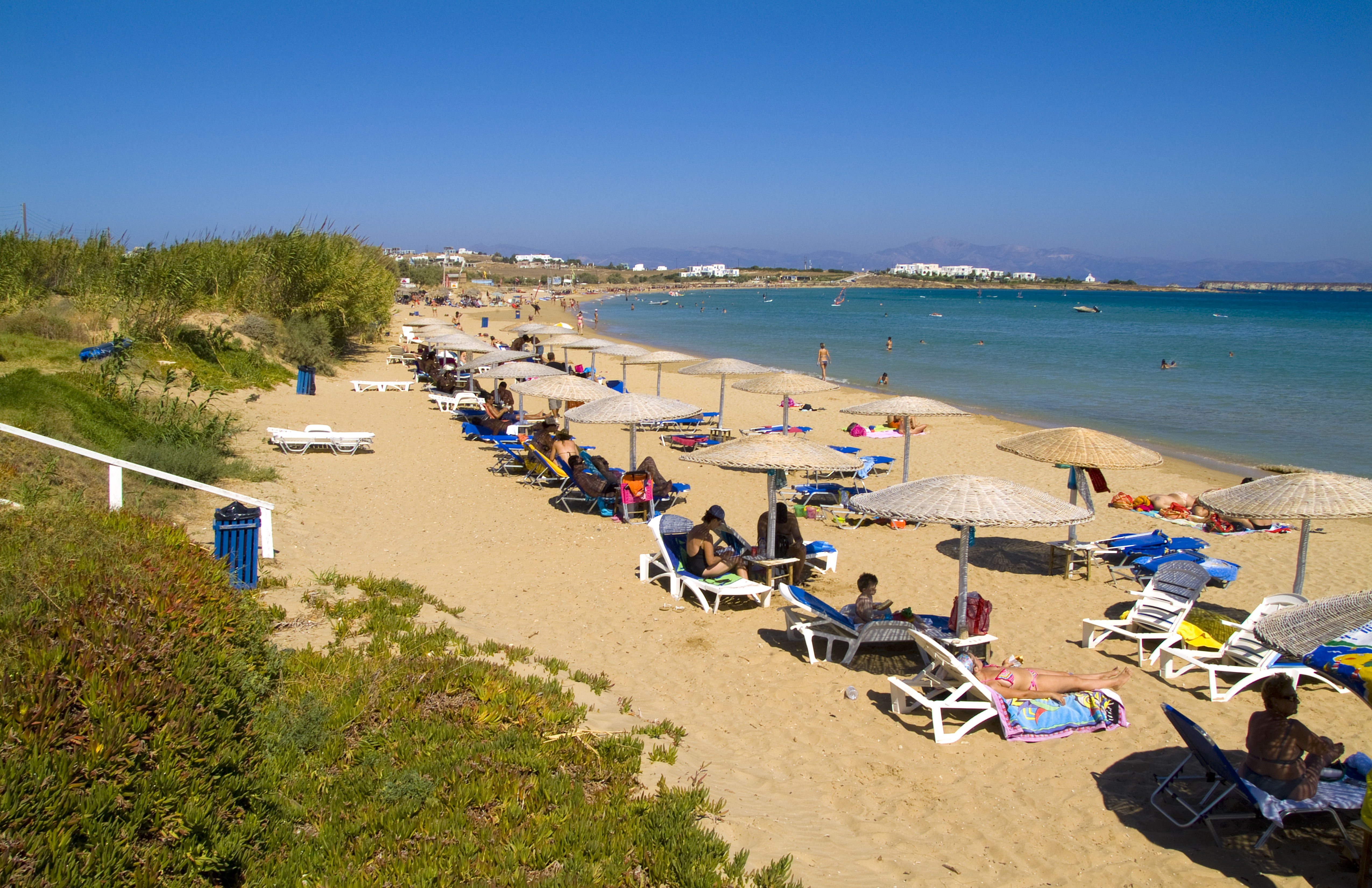 Beach touts in Paros, Greece, sometimes pick up old receipts and give them to new customers as a way to avoid paying taxes to the government.