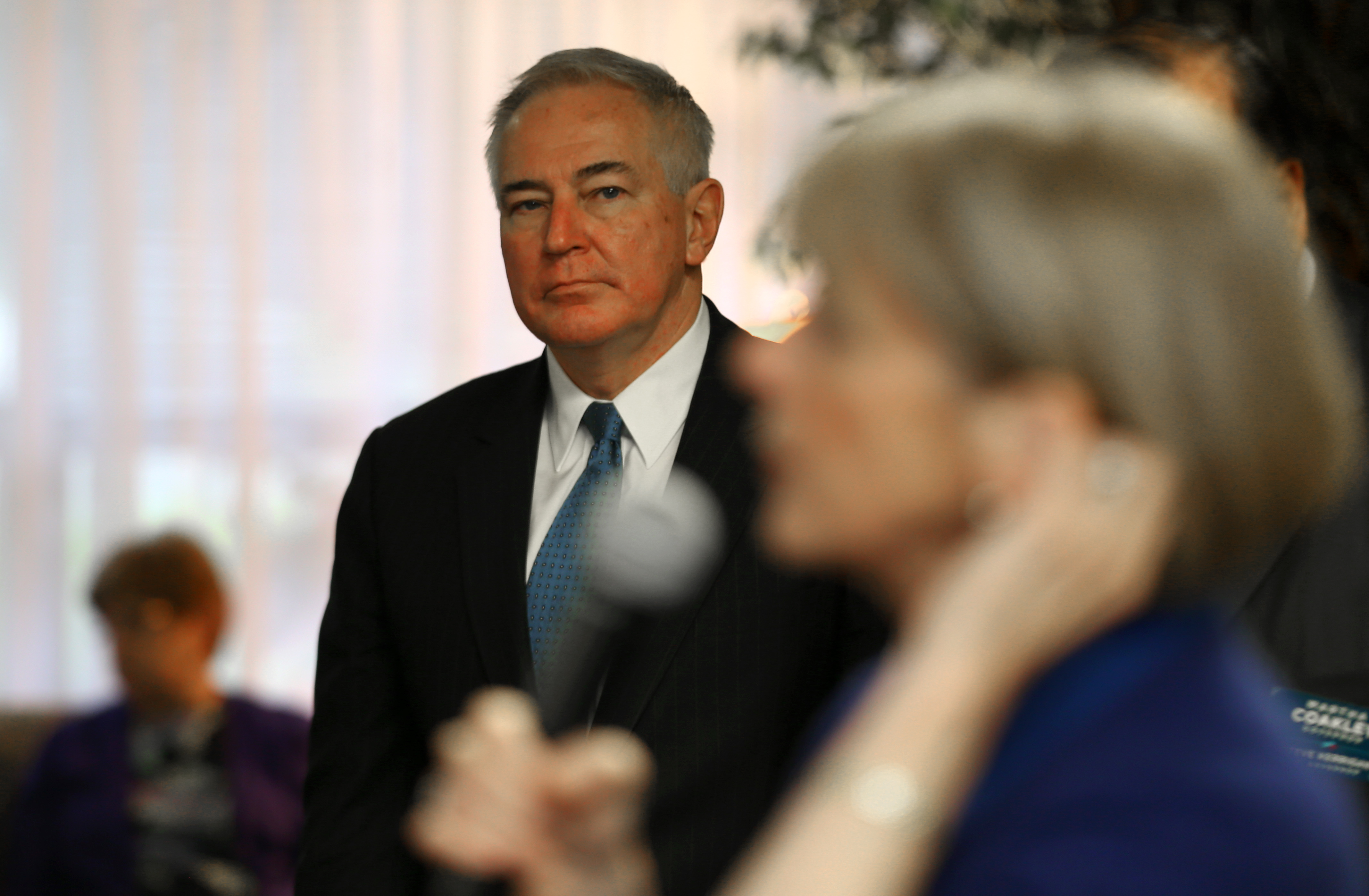 Gubernatorial candidate Martha Coakley campaigned last week in Quincy, where her husband, Thomas F. O’Connor Jr., was an object of curiosity for voters, some of whom peppered him with questions.