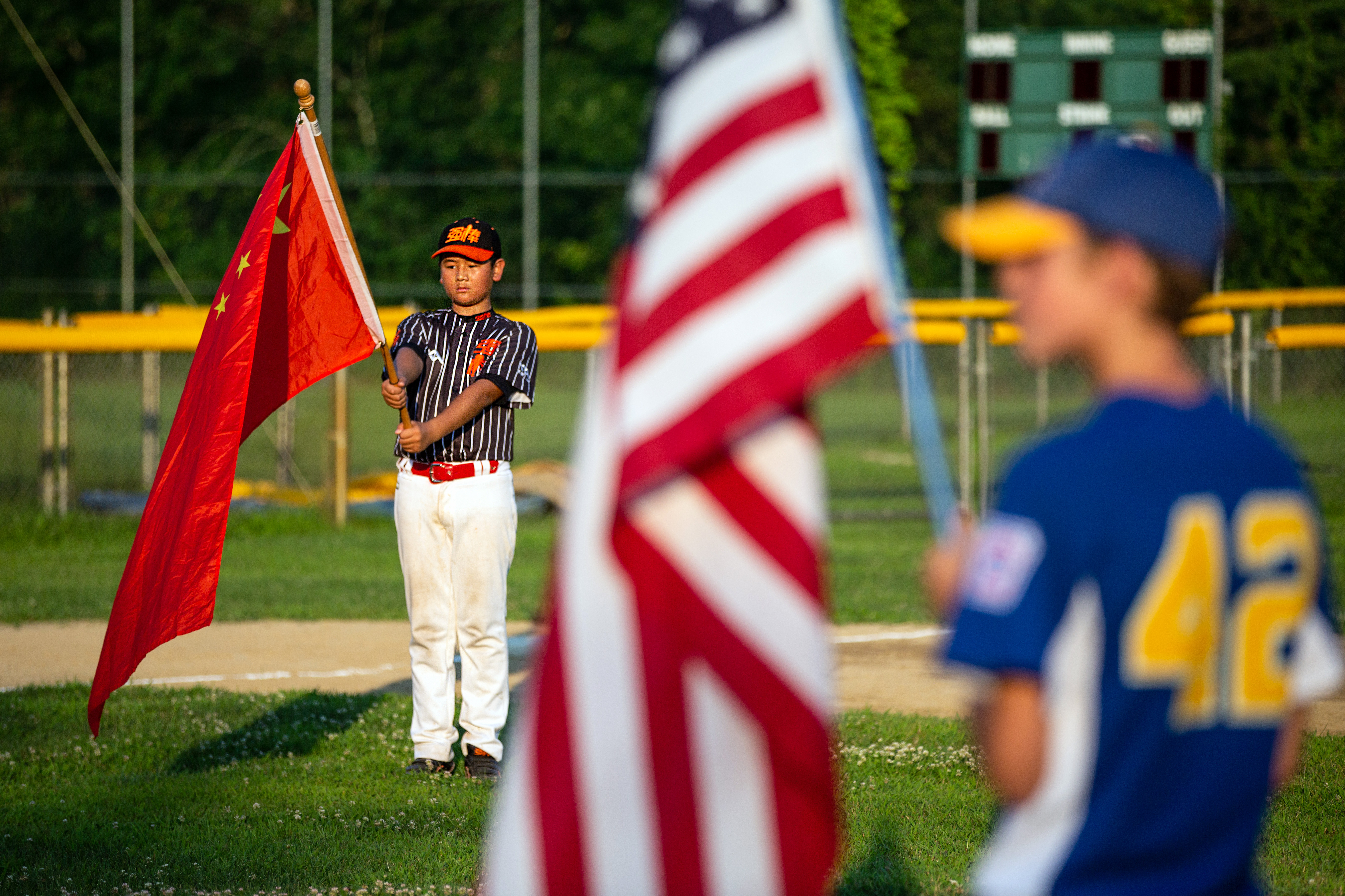 The national anthems of both countries were played at Veterans Field in Acton.