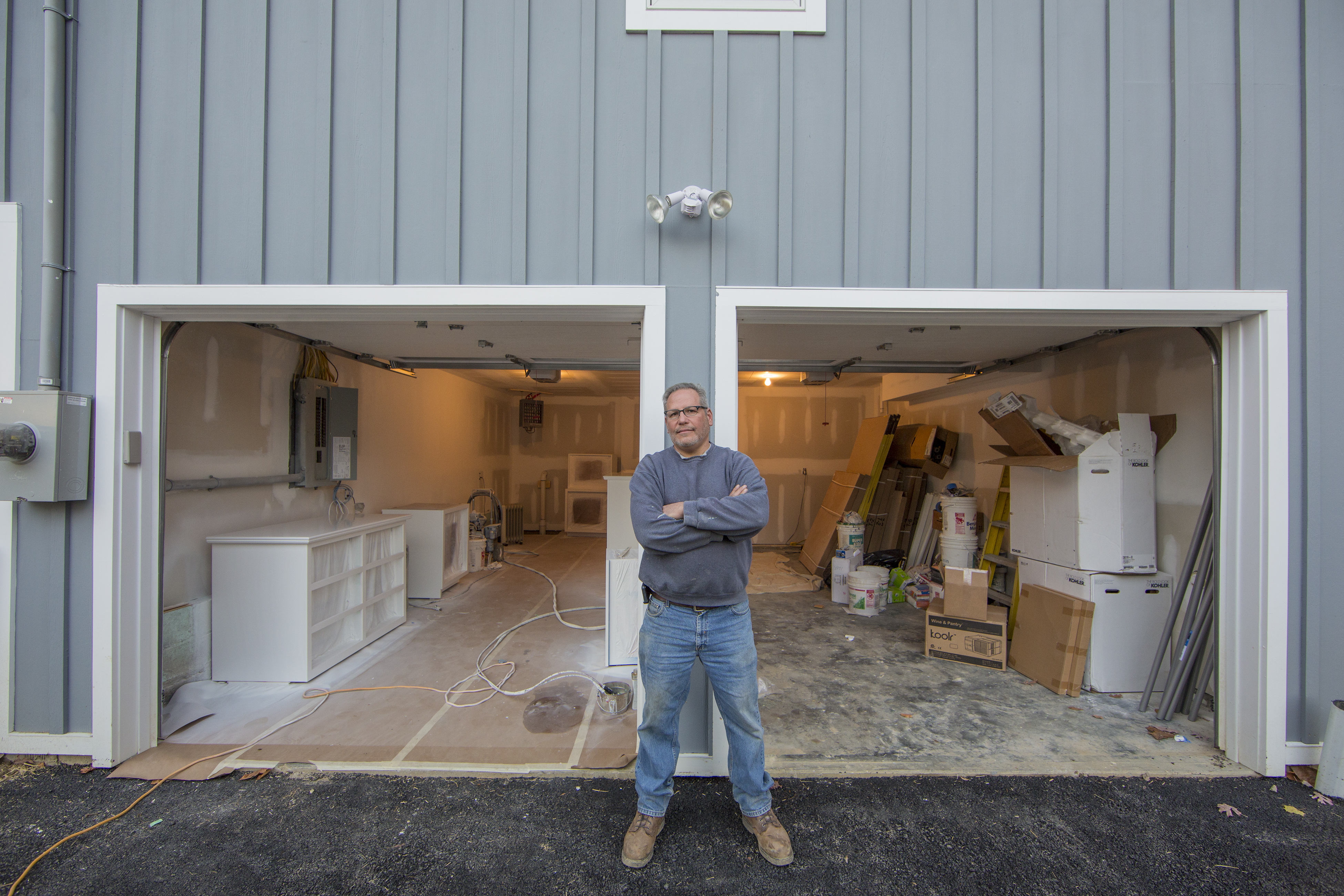 Peter Glass, owner of Meadowbrook Builders, at a construction site for a garage in Briarcliff Manor, N.Y.