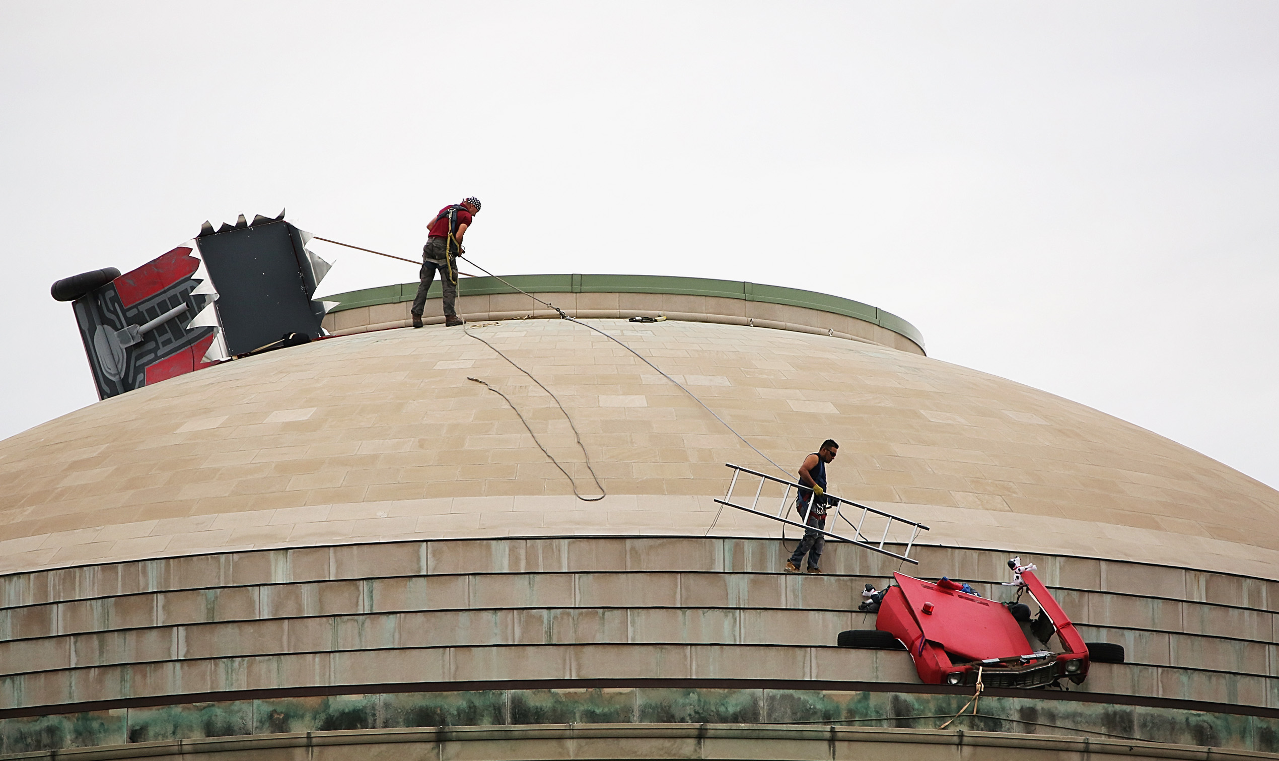 Workers removed a fire truck from MIT's Great Dome in September 2015.