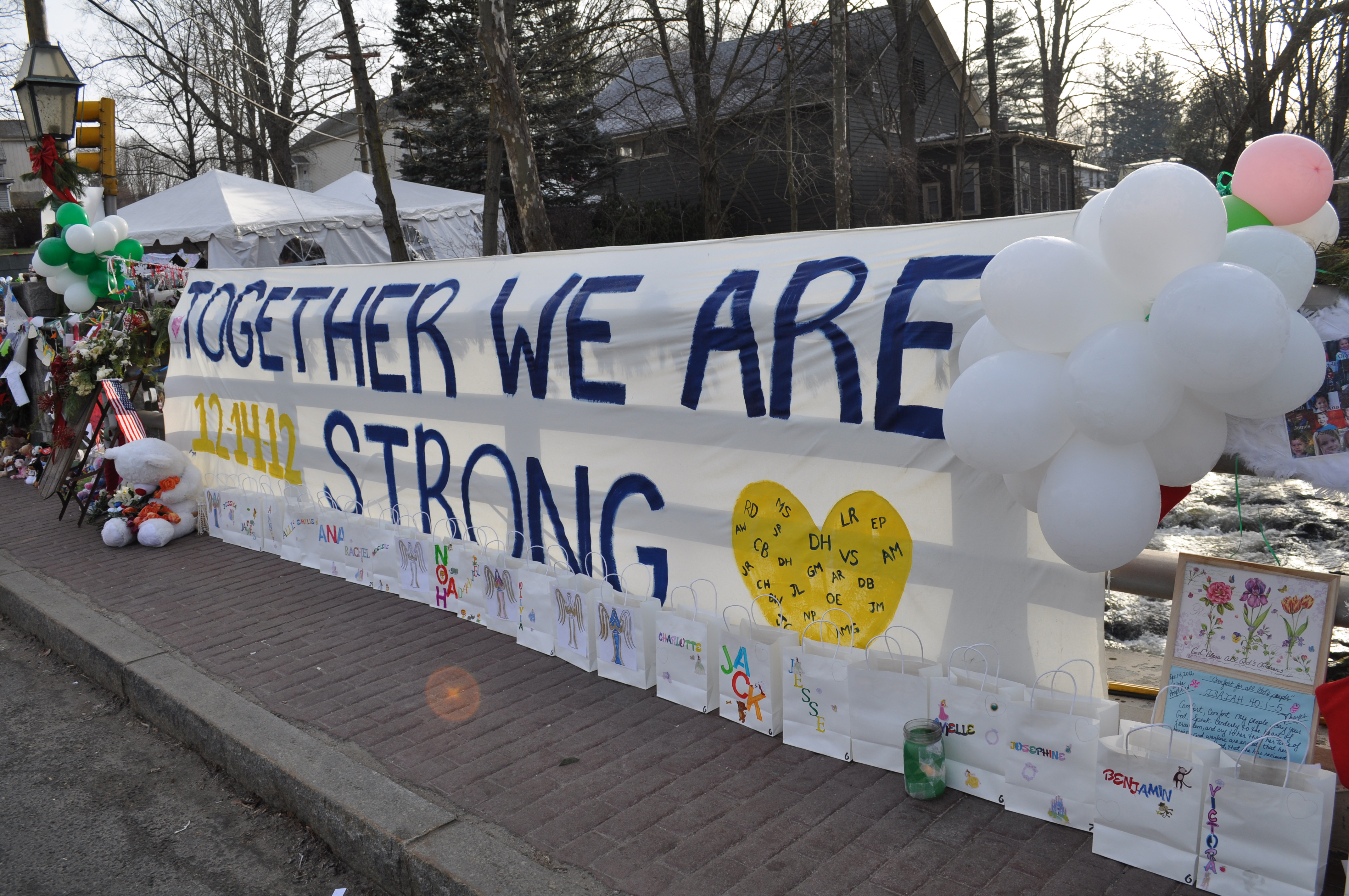 Bellingham resident Jeff Belanger took several photos of the spontaneous memorials around his hometown of Newtown that sprang up in late December. This banner was hung in the center of Sandy Hook, a village of Newtown.