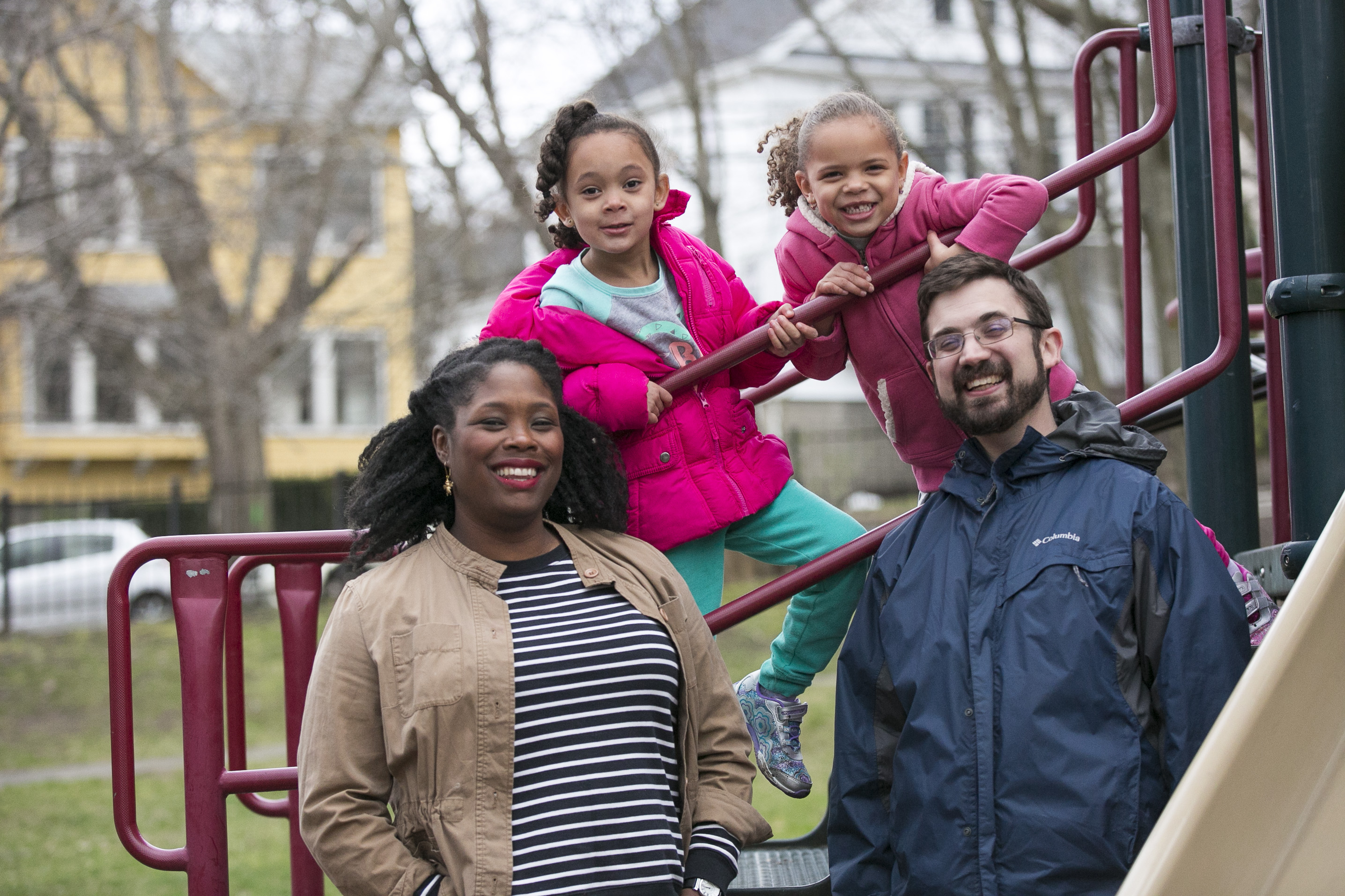 From left, Mareshia Donald; her 5-year-old twins, Gloria and Inara Donald-Sosnoff; and her husband, Joe Sosnoff. The family bought a home in Arlington because of the friends they made there and its proximity to Cutter Park.