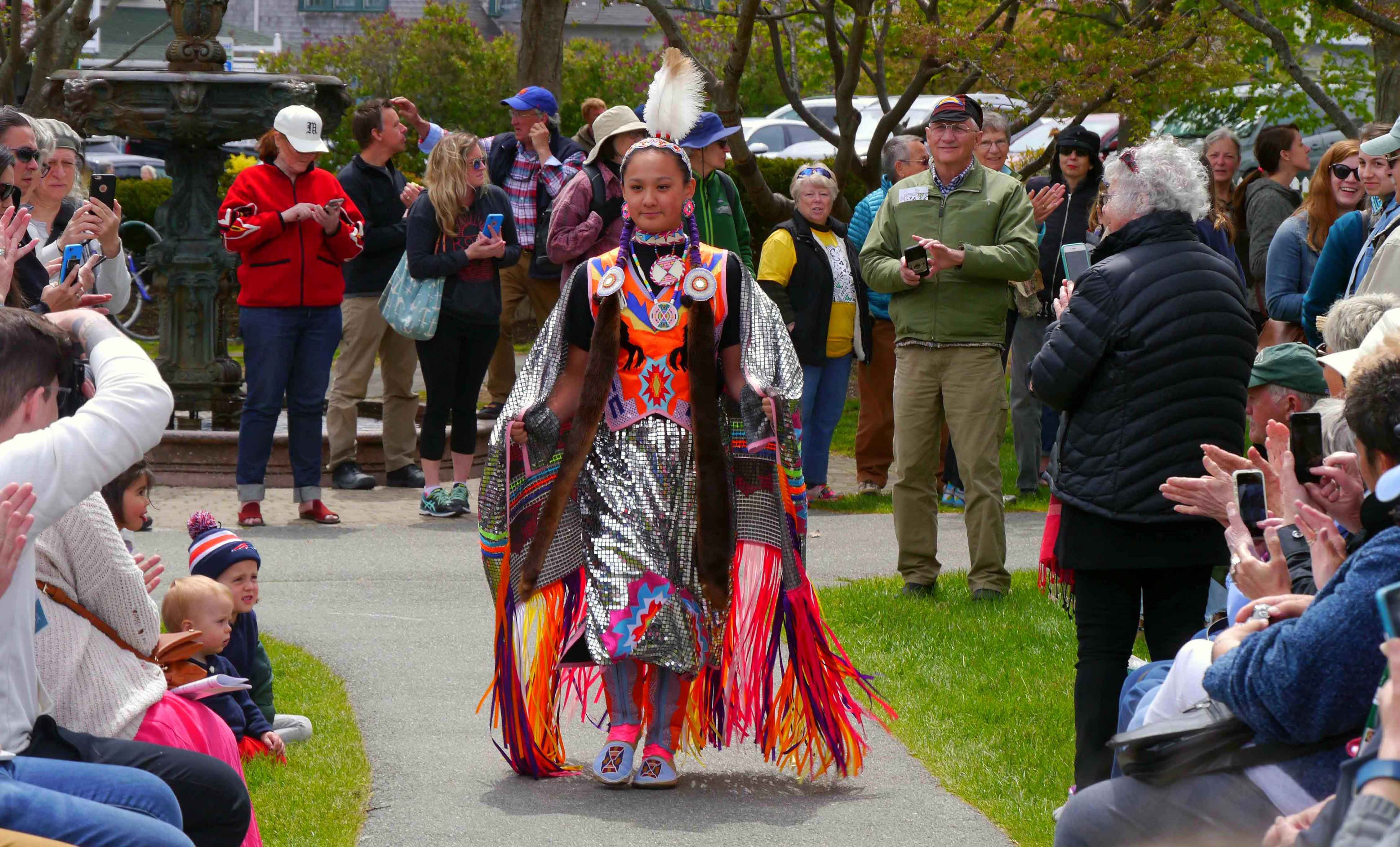 Contemporary Native American fashion based on traditional costume at the Abbe Museum Indian Market fashion show.