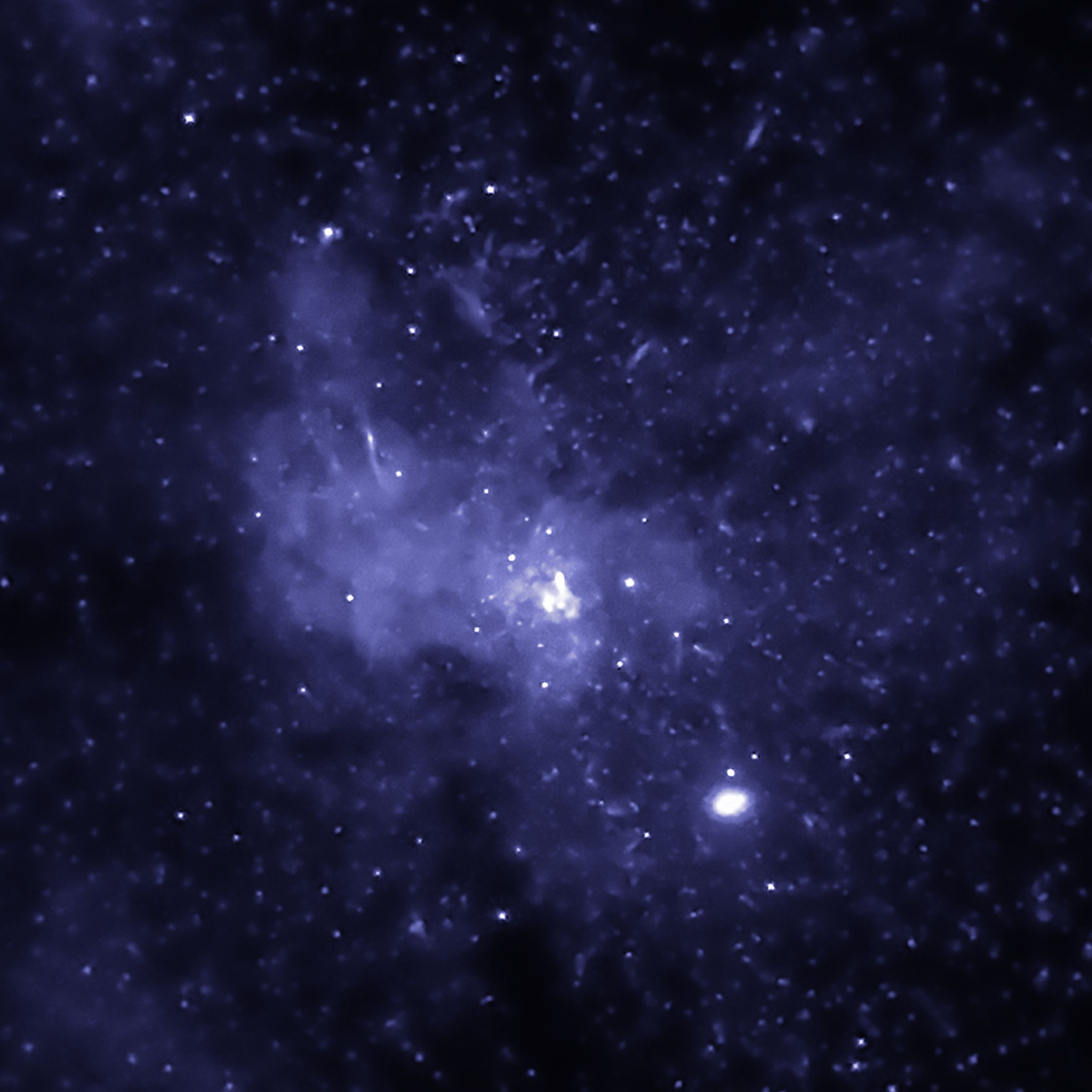 This image obtained from NASA on May 31 shows thousands of black holes that astronomers have discovered located near the center of our Milky Way galaxy.