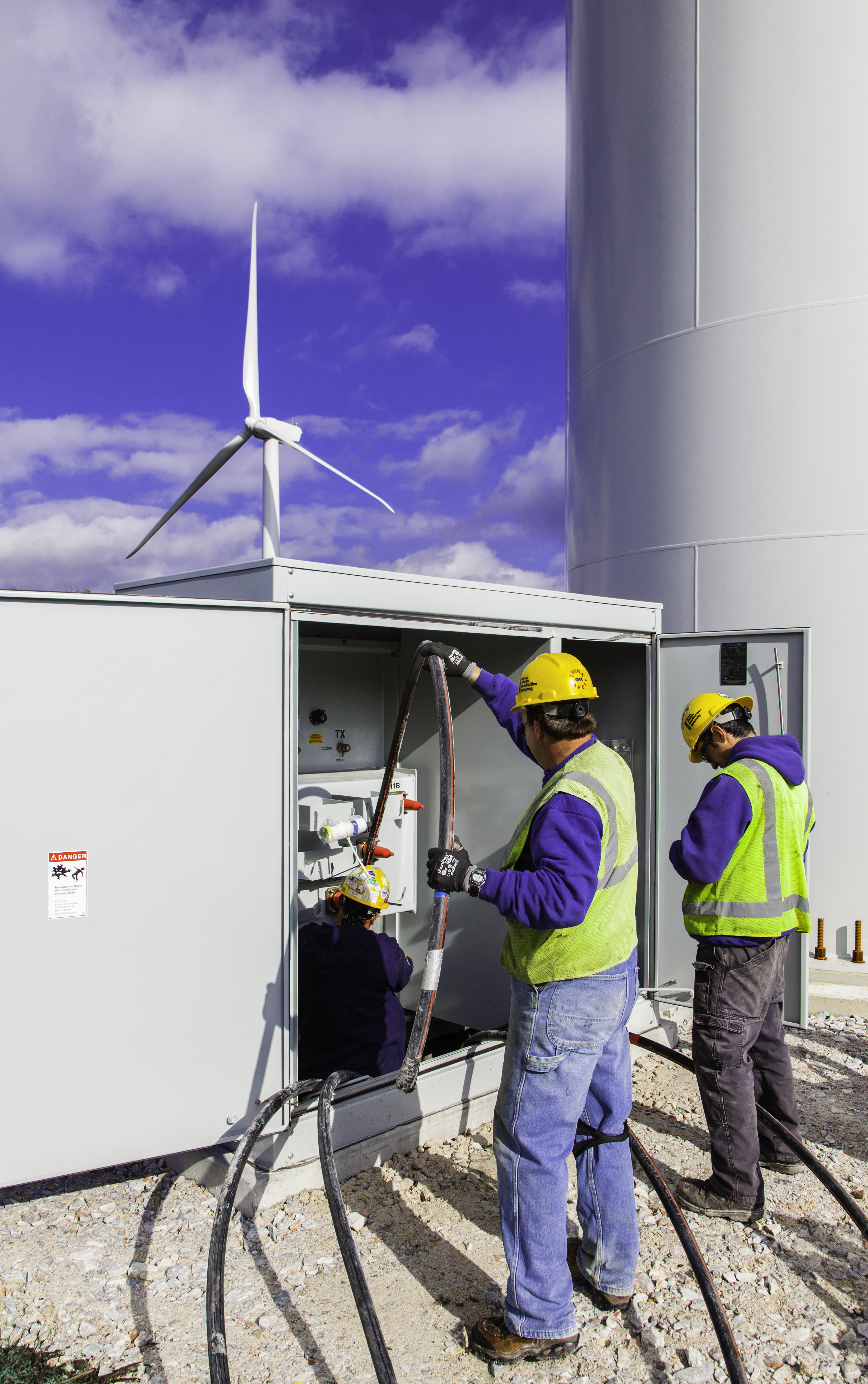 Workers made electrical connections at a transformer at one of the Hoosac’s 19 wind turbines.