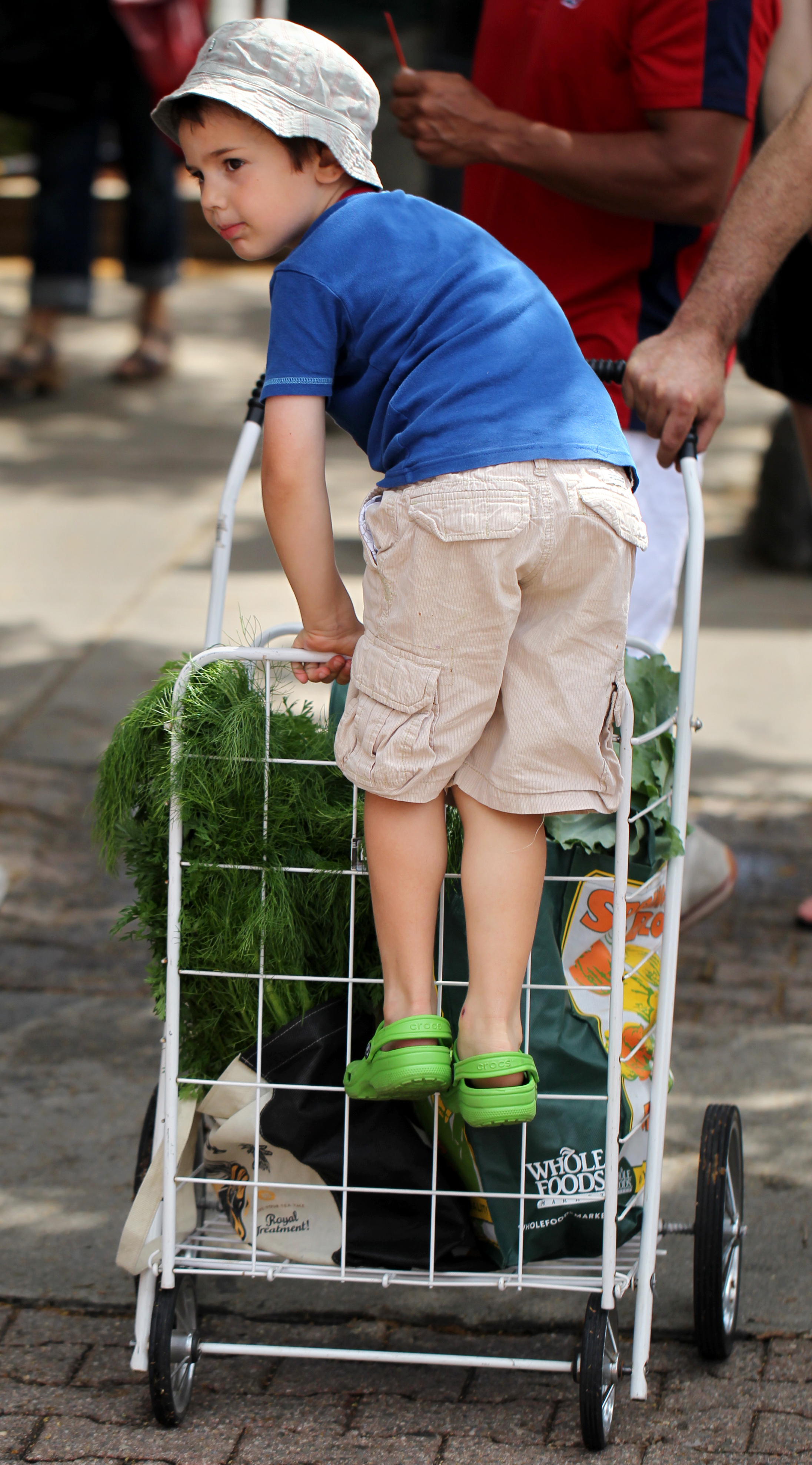Rafael Ronen (right), 5, learned about healthy eating at the Union Square Farmers Market.