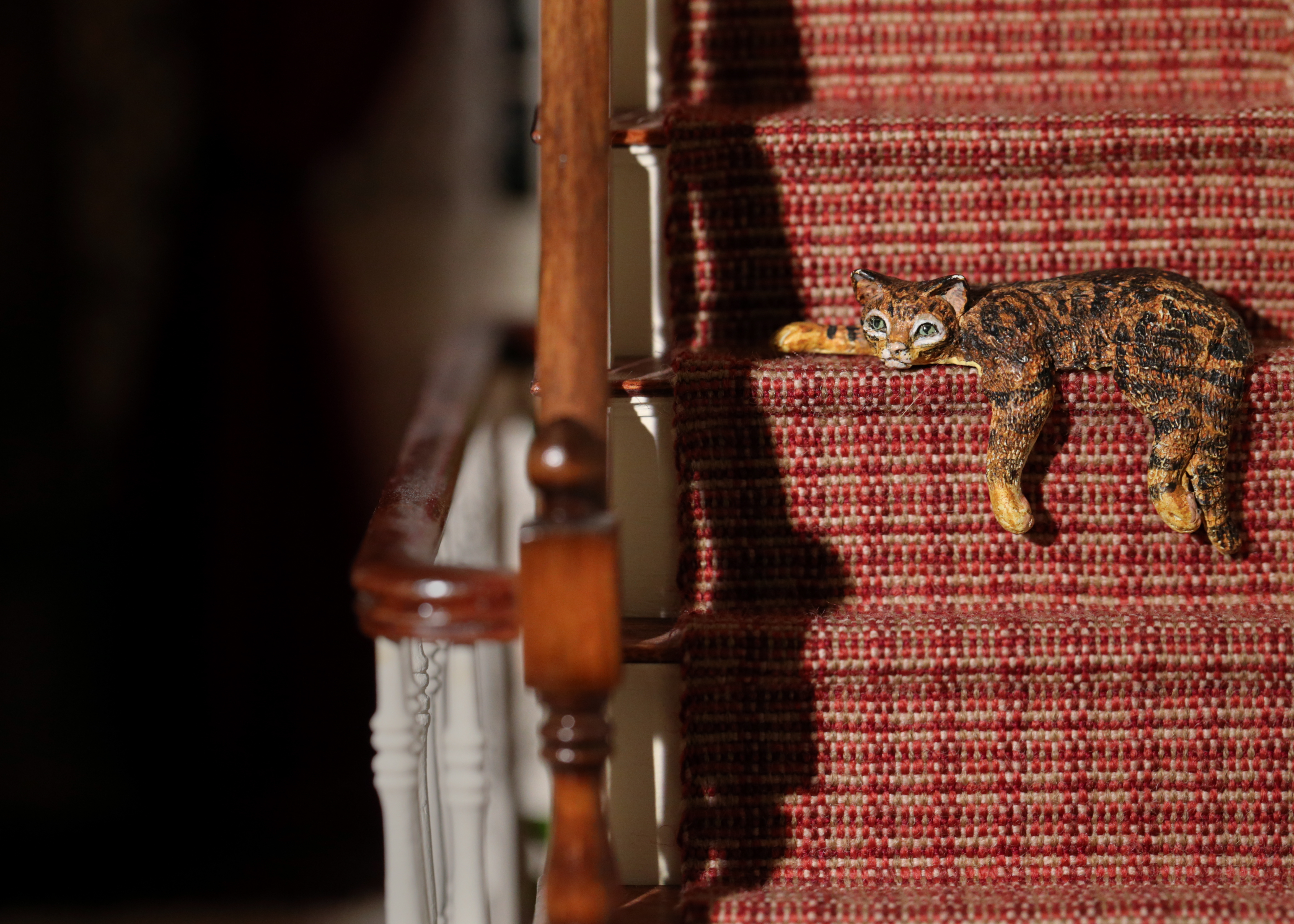 The dollhouse family cat.
