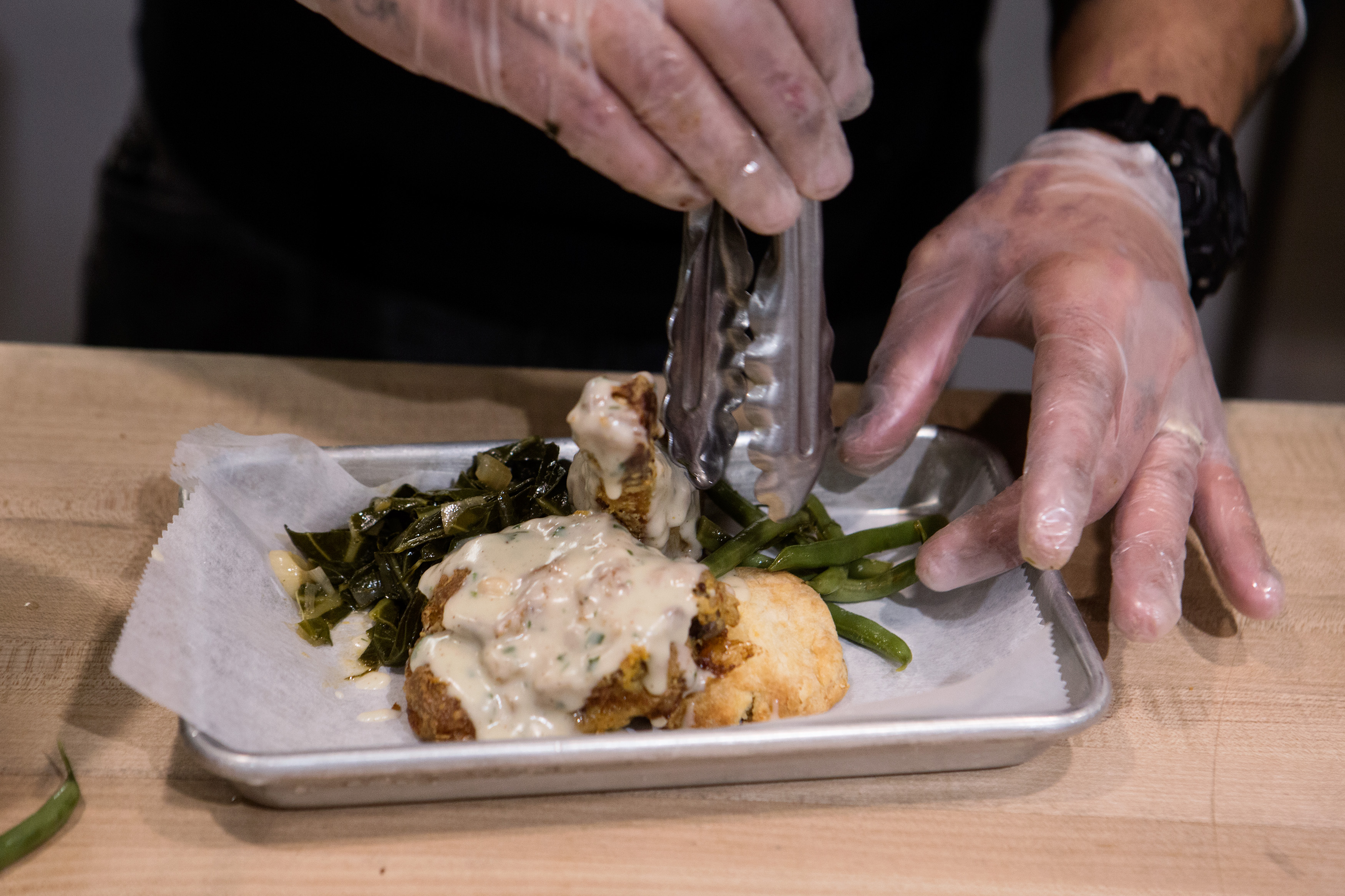 Tim Ellis prepares brined and baked chicken.