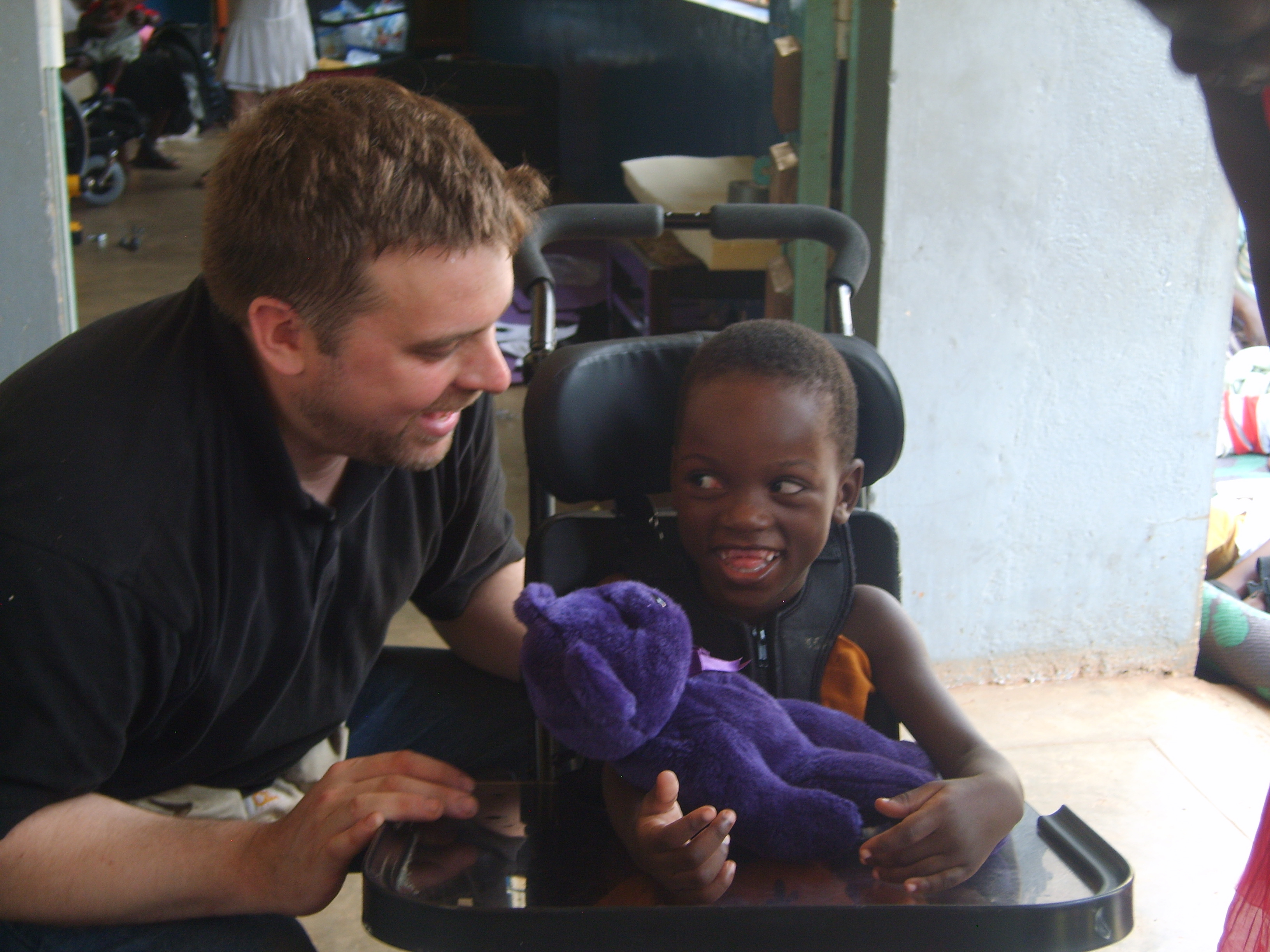 On a trip to Uganda in July, Dana passed along Ruth’s wheelchair (and her favorite teddy bear) to a girl named Madrine.