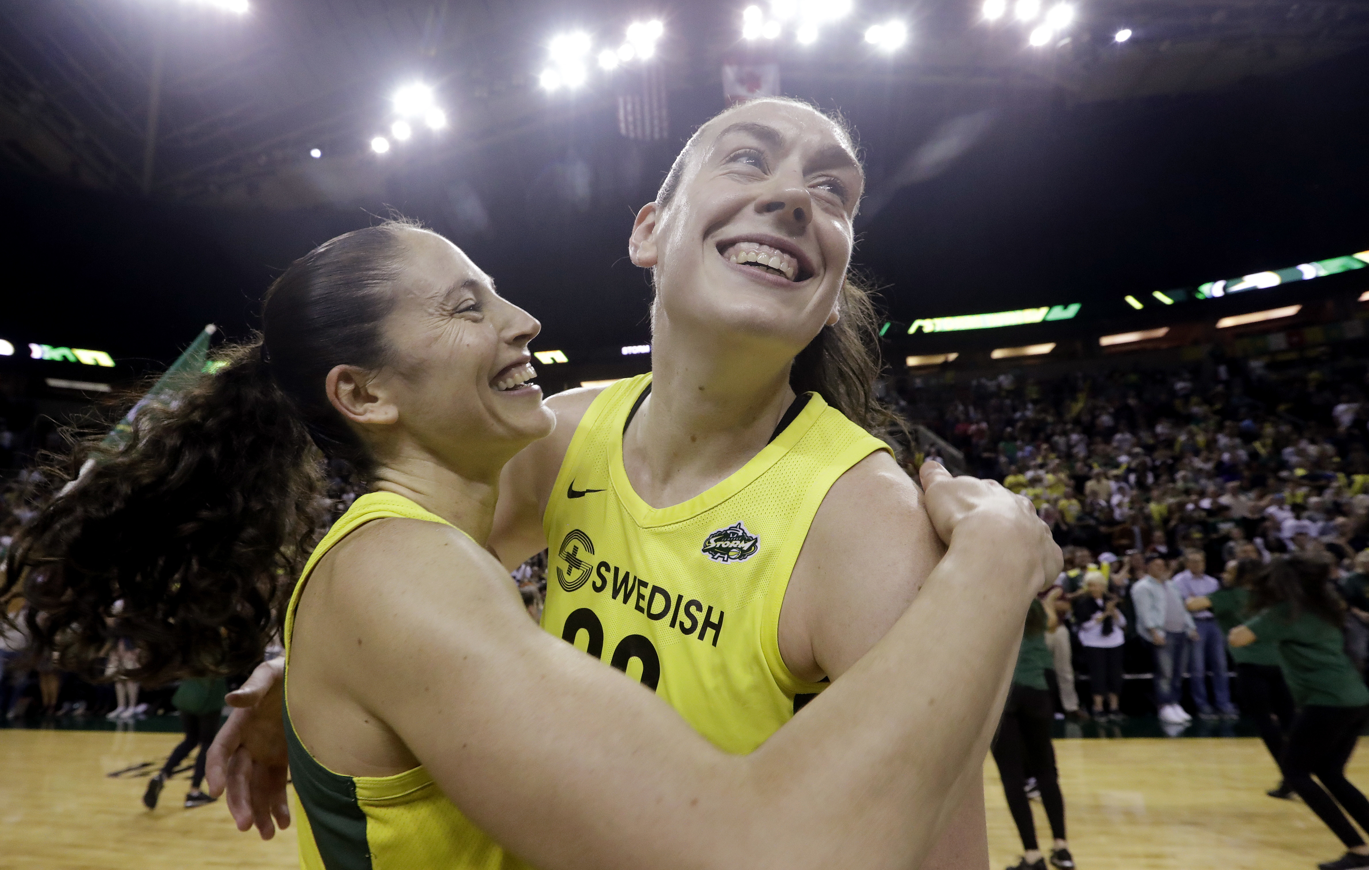Sue Bird and Breanna Stewart embrace after the Storm advanced to the WNBA Finals.