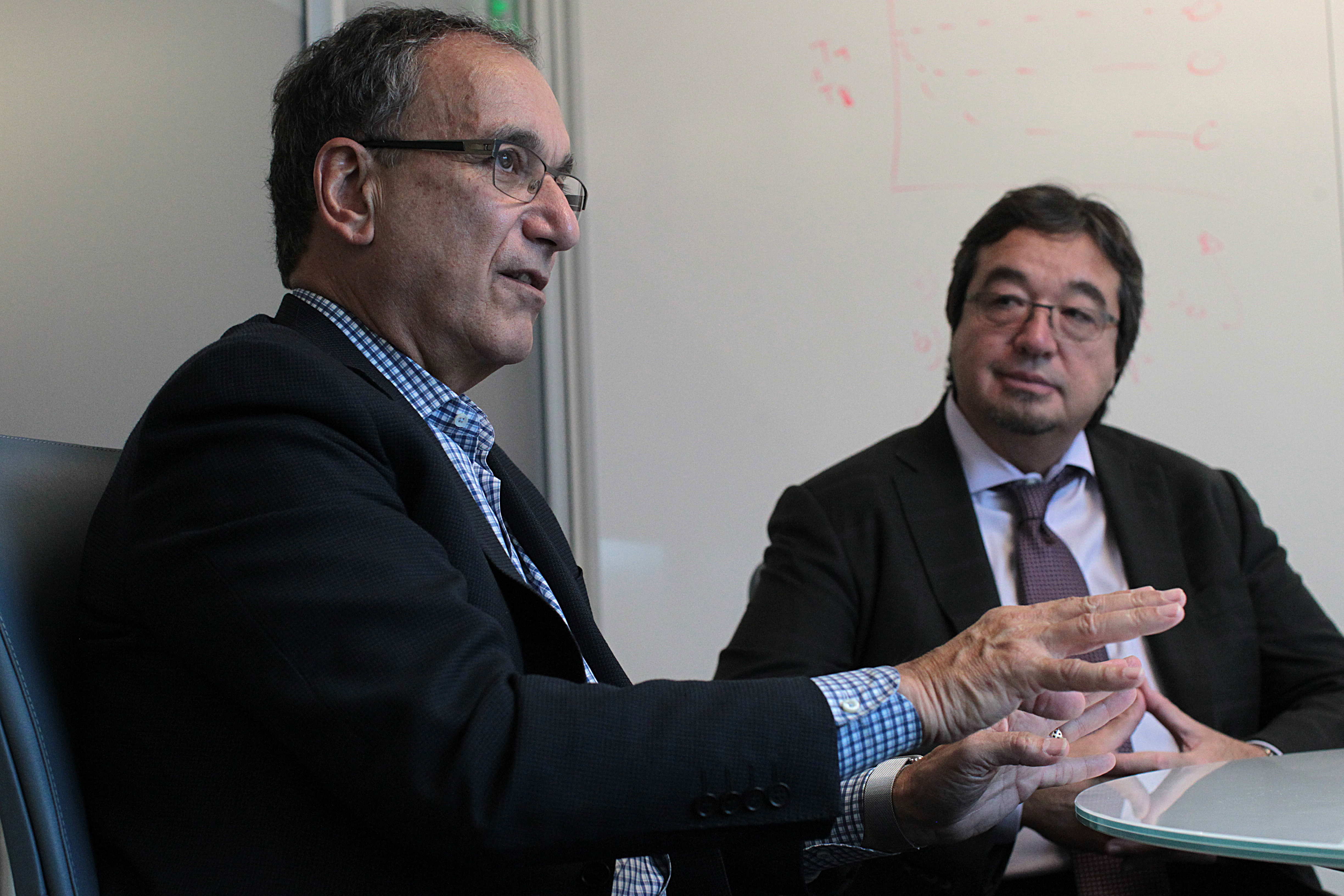 “The reason we’re restructuring is this amazing pipeline we have to fund. We’re making drugs that would be first in class in what they do, and that’s always risky,” said Biogen CEO George Scangos (left).
