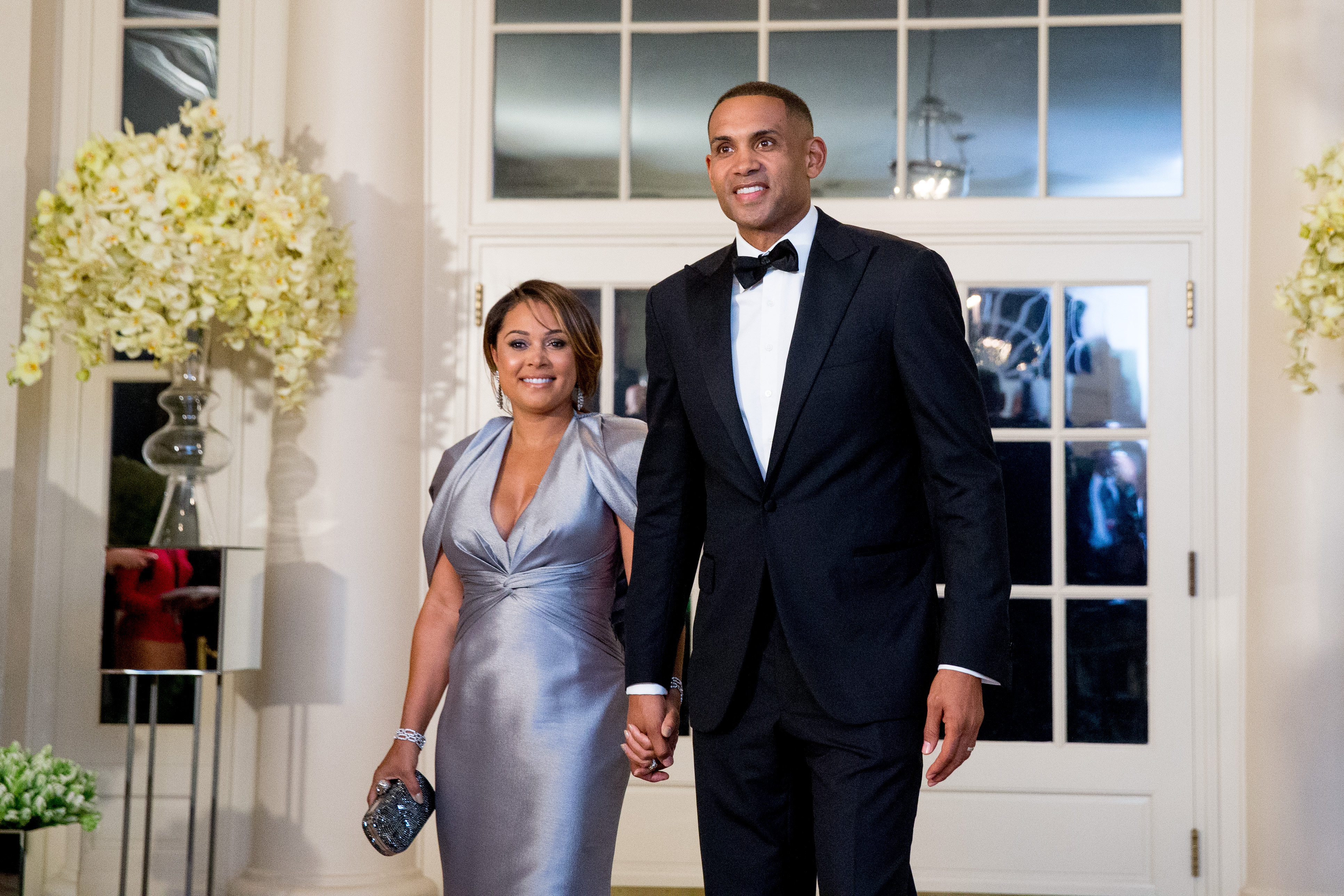 Grant Hill and his wife, Tamia.
