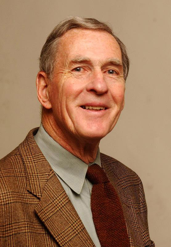 Mr. Woodlief was recalled as a calming influence in an often chaotic newsroom.