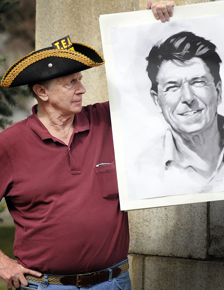 Len Mead of Westborough with a portrait of President Reagan at the Tax Day Tea Party Rally in Worcester.