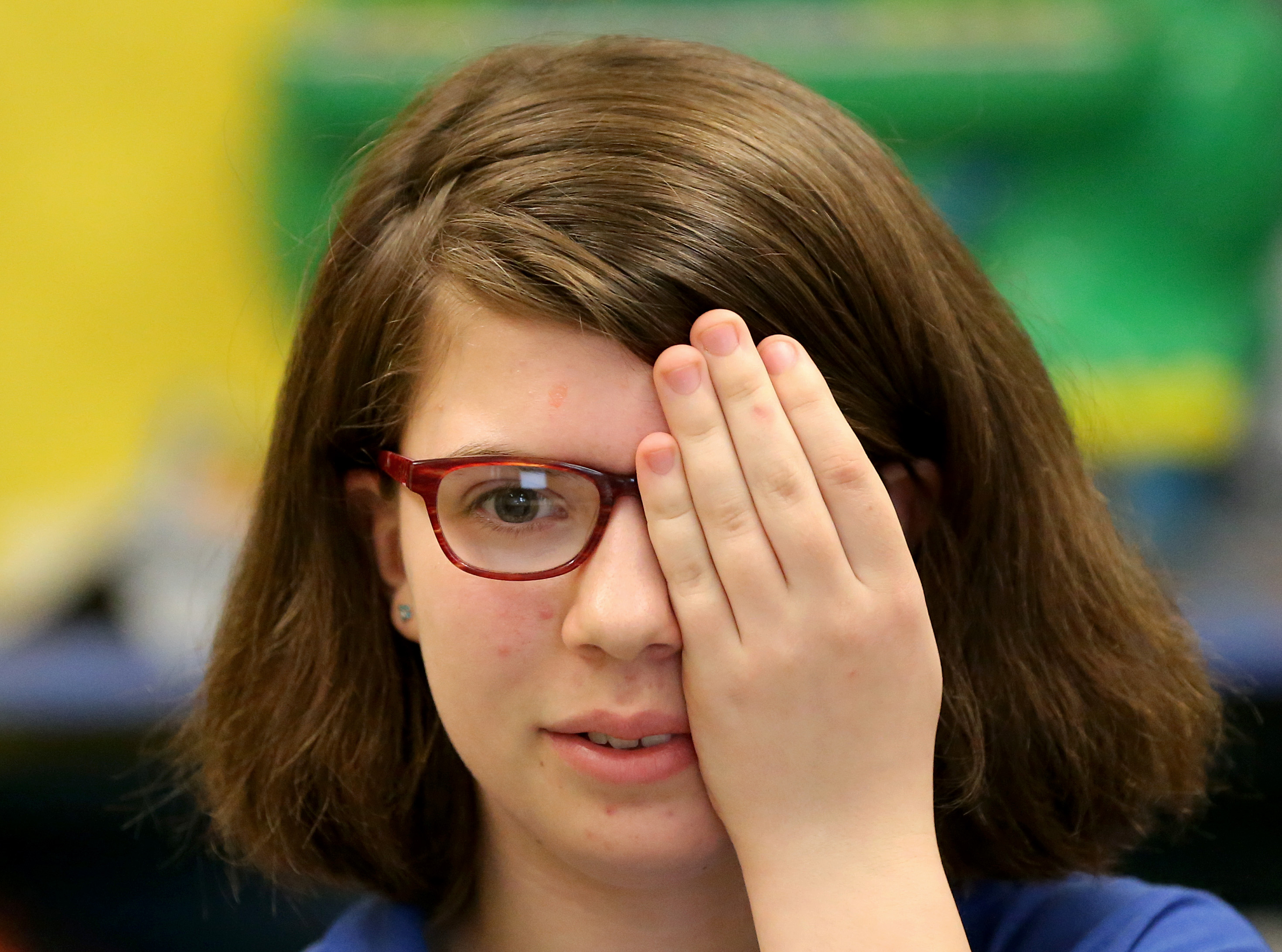 Sixth-grade student Emely Castillo went through an eye examination, which she said was more fun than her math class.