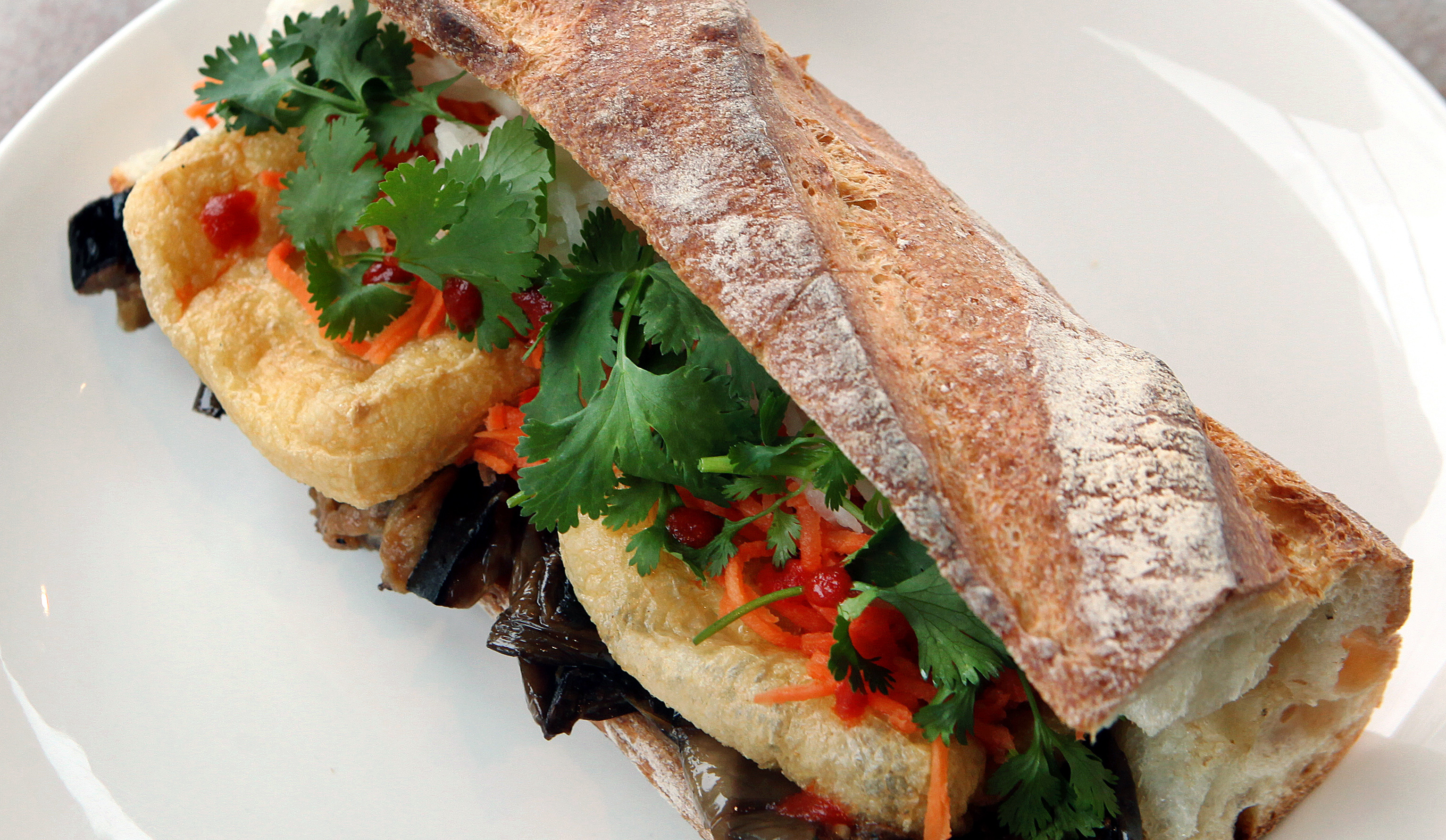 At Strip-T's in Watertown, the eggplant banh mi sandwich.