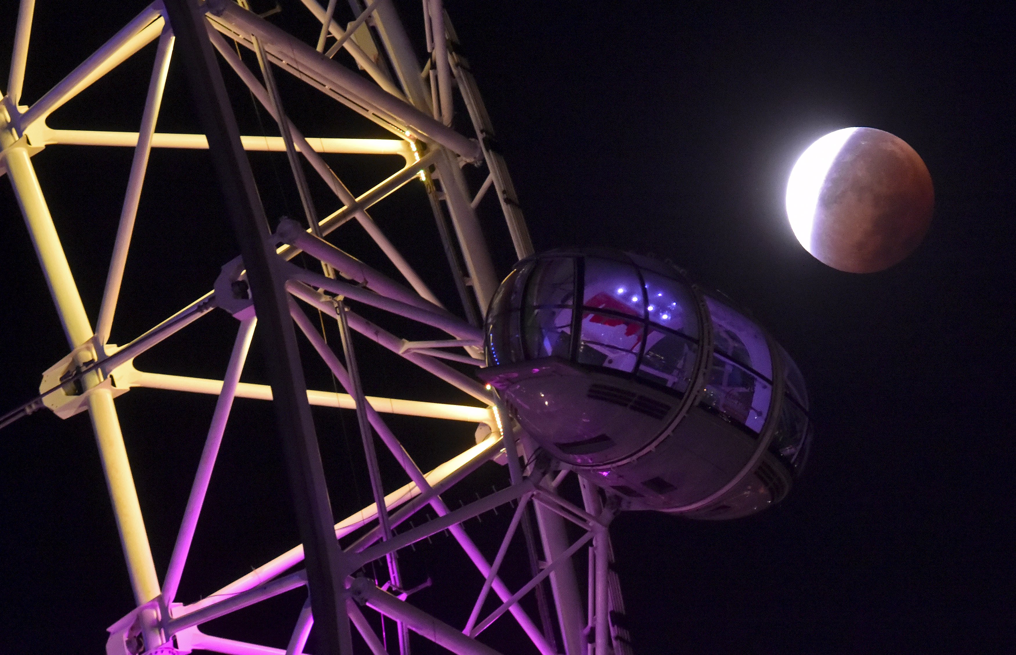 The eclipse as seen from next to the London Eye wheel in London.