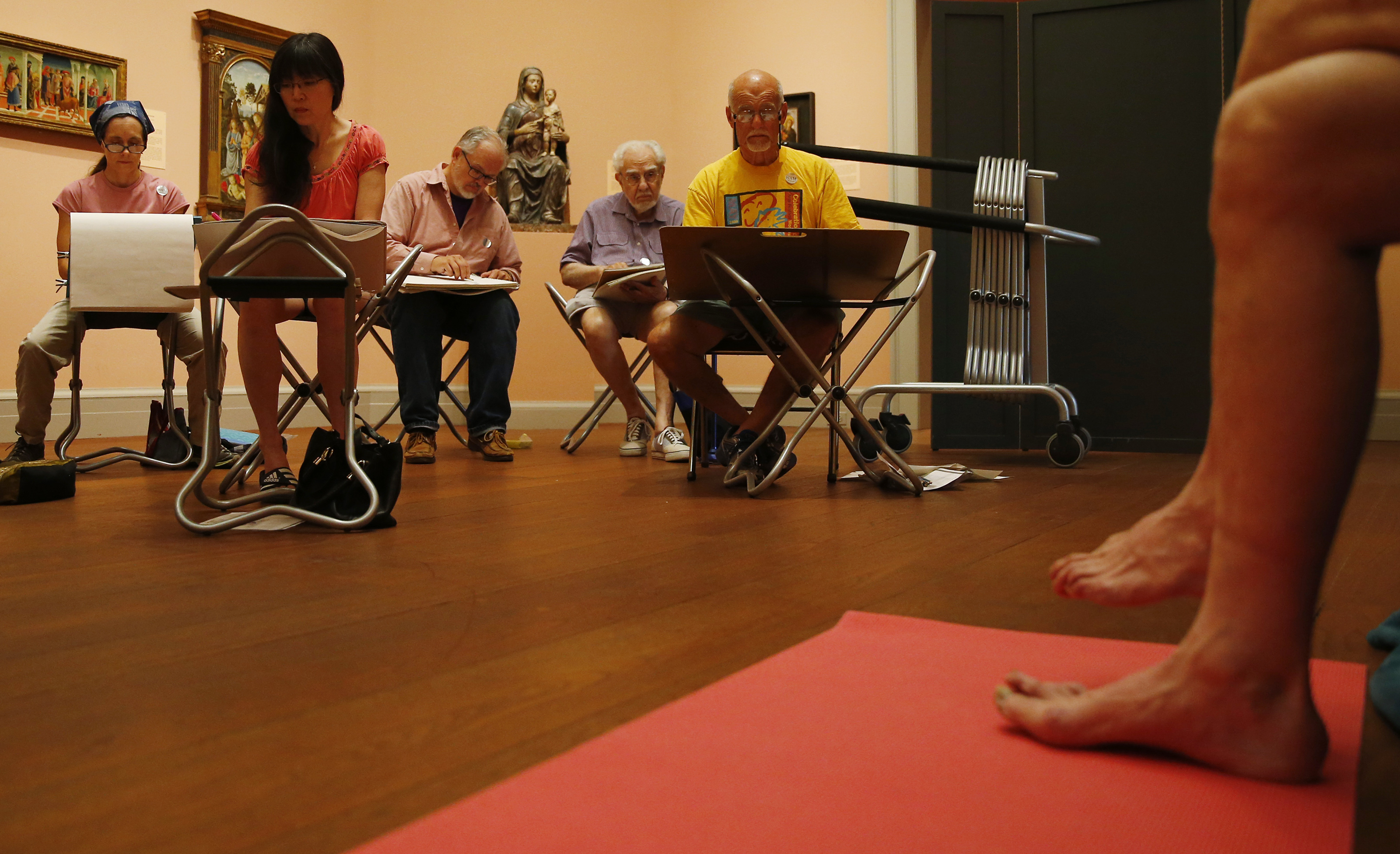 A model held a pose as people drew during a nude figure drawing class at the Worcester Art Museum in Worcester last month.