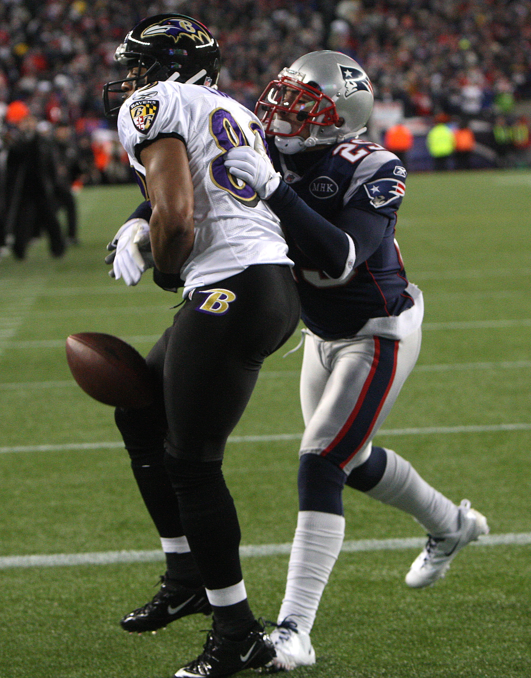 Sterling Moore knocks the ball out of Lee Evans’s hands in the end zone, saving what may have been the winning touchdown.