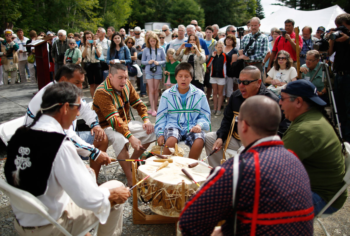 Penobscot Indian Nation members performed before the Veazie Dam breach. The tribe ties the river to their history.