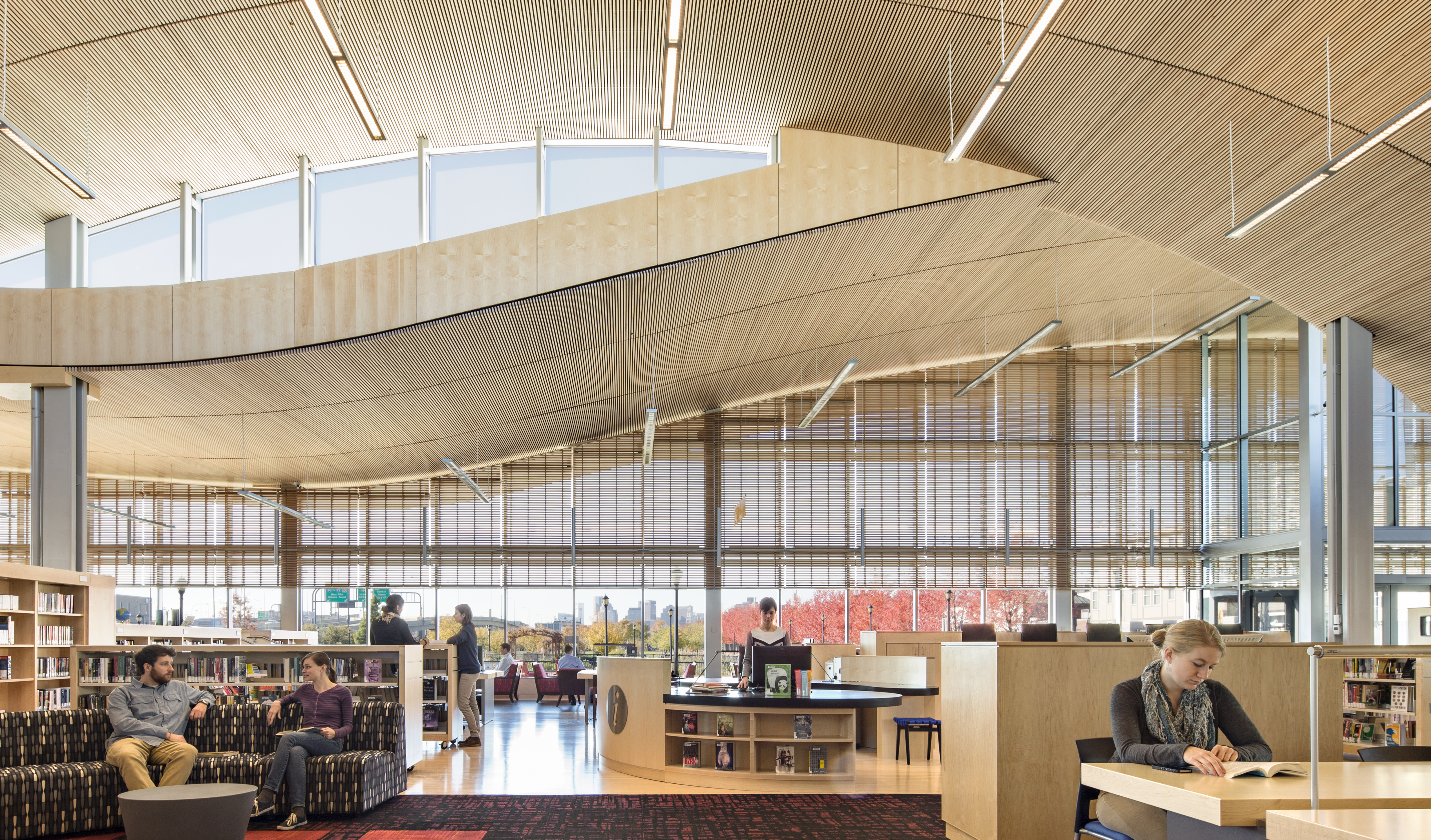 The Boston Public Library’s East Boston branch has no interior walls, giving the building a sense of community that is different from the typical library feel created by separate areas for different age groups.