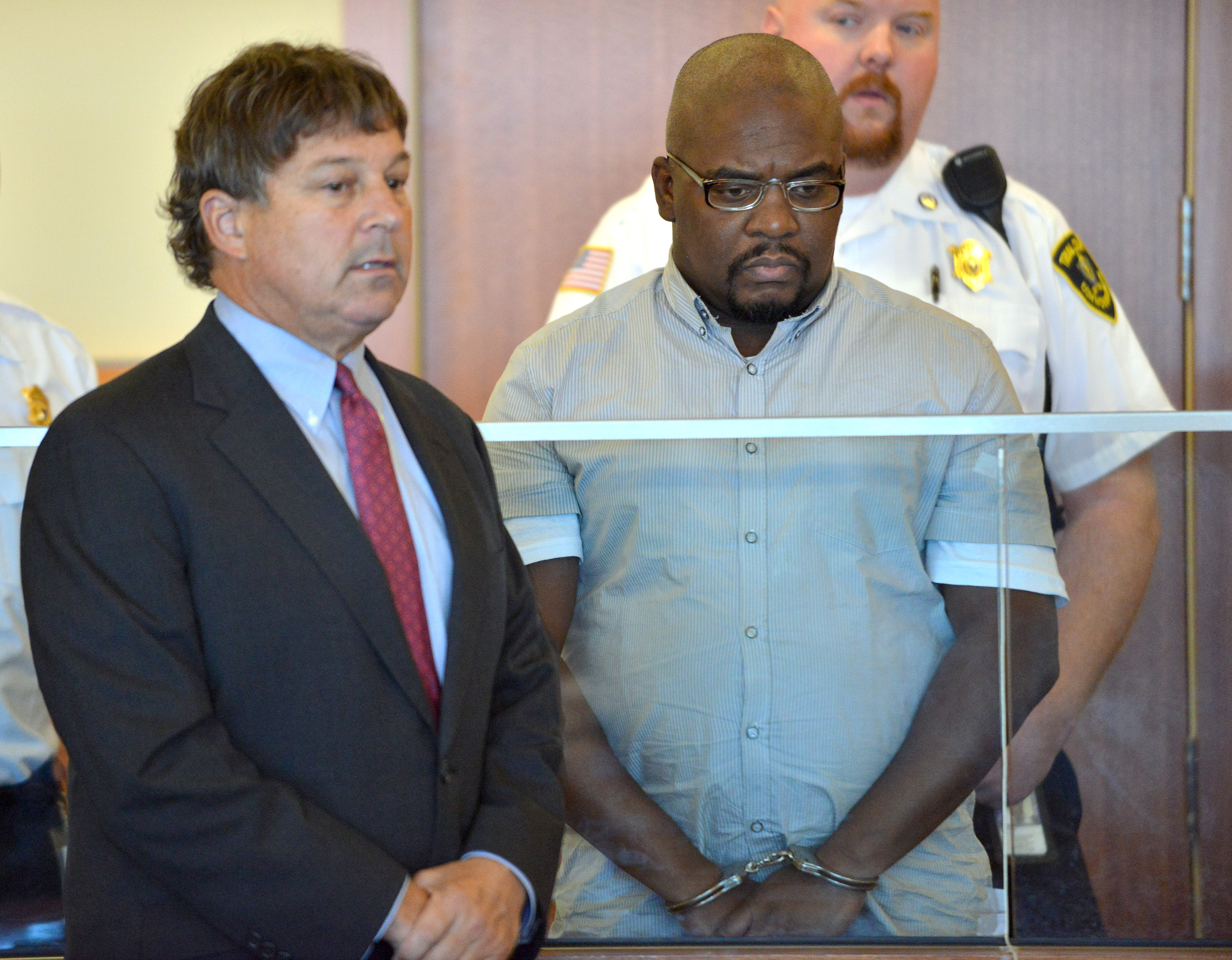 Ernest Wallace, 41, was charged Thursday with being an accessory after the fact to the murder of Odin Lloyd.