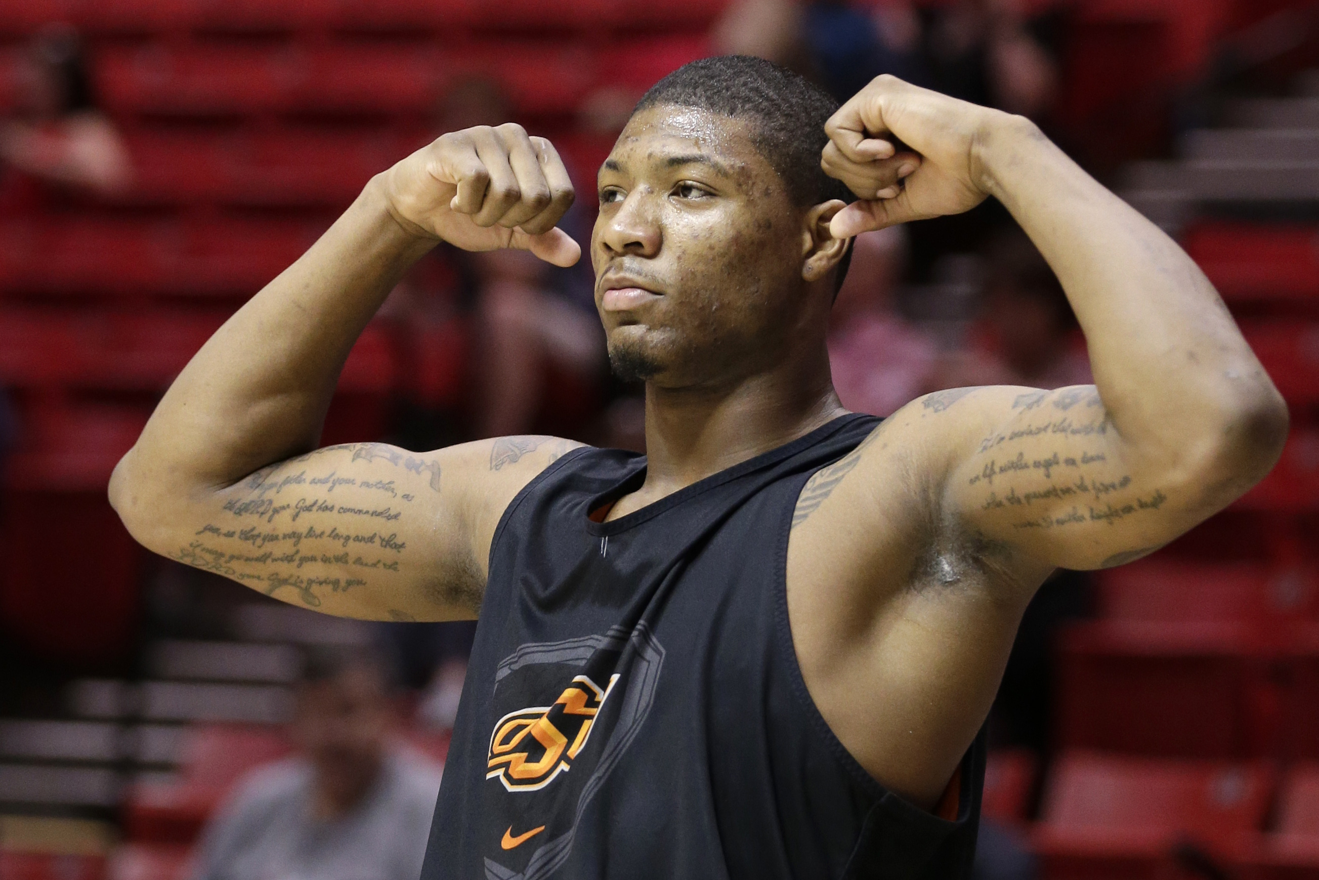 Marcus Smart averaged 18 points, 5.9 rebounds, and 4.8 assists in 2013-14.
