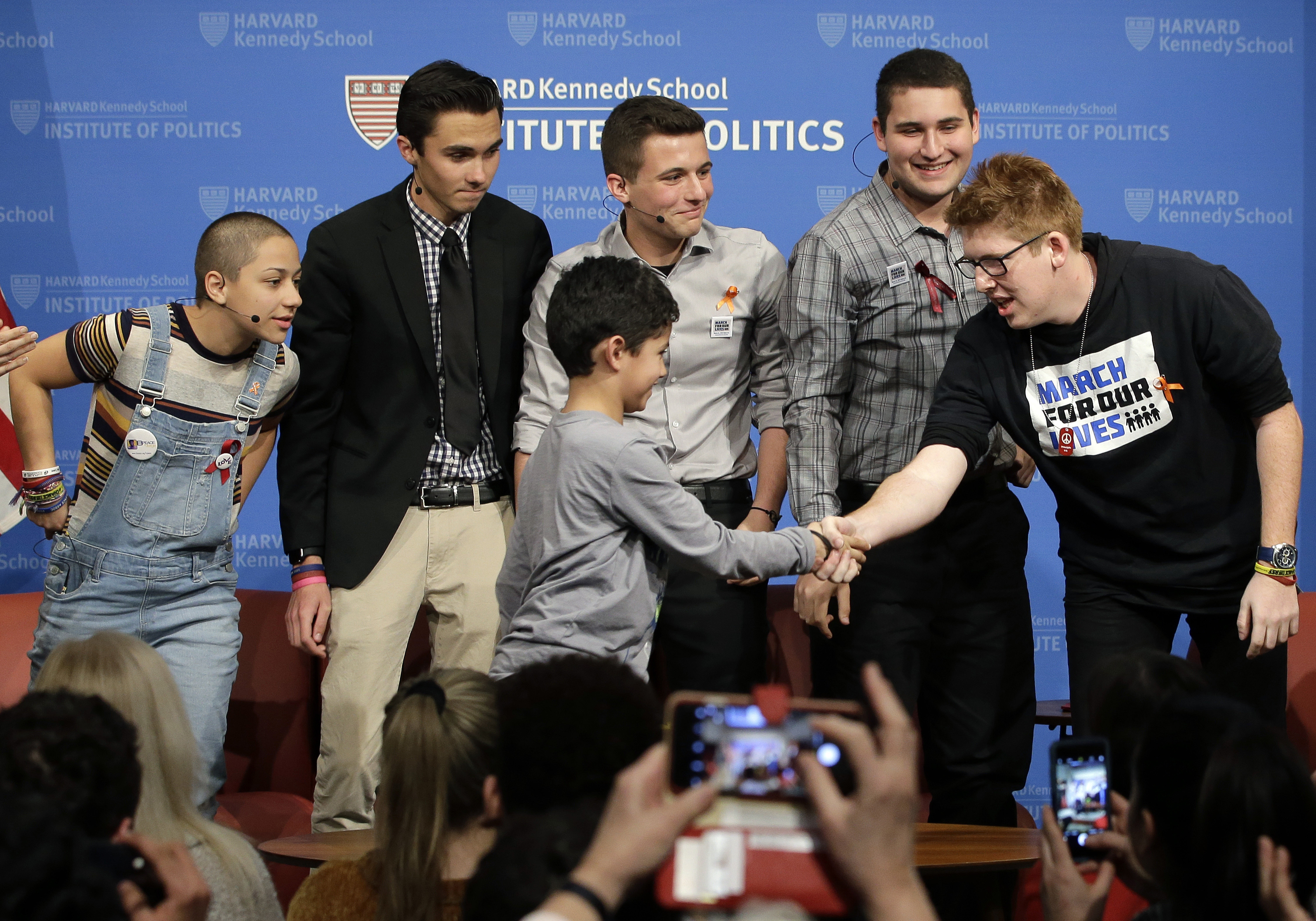 Noah King, 9, of Belmont stepped on stage to greet Marjory Stoneman Douglas High School students at Harvard on Tuesday.