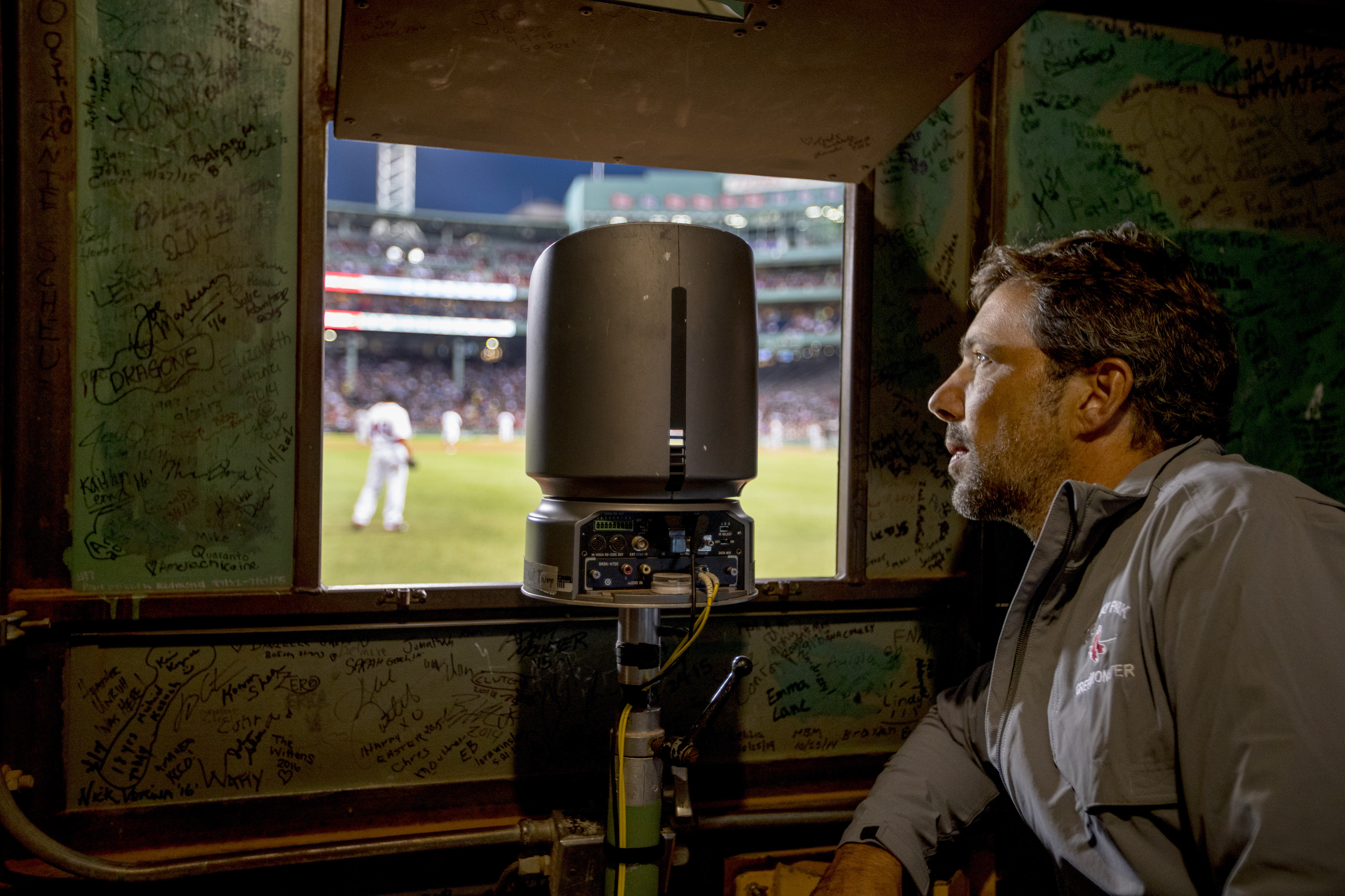 The scoreboard operator has a unique view of the action.