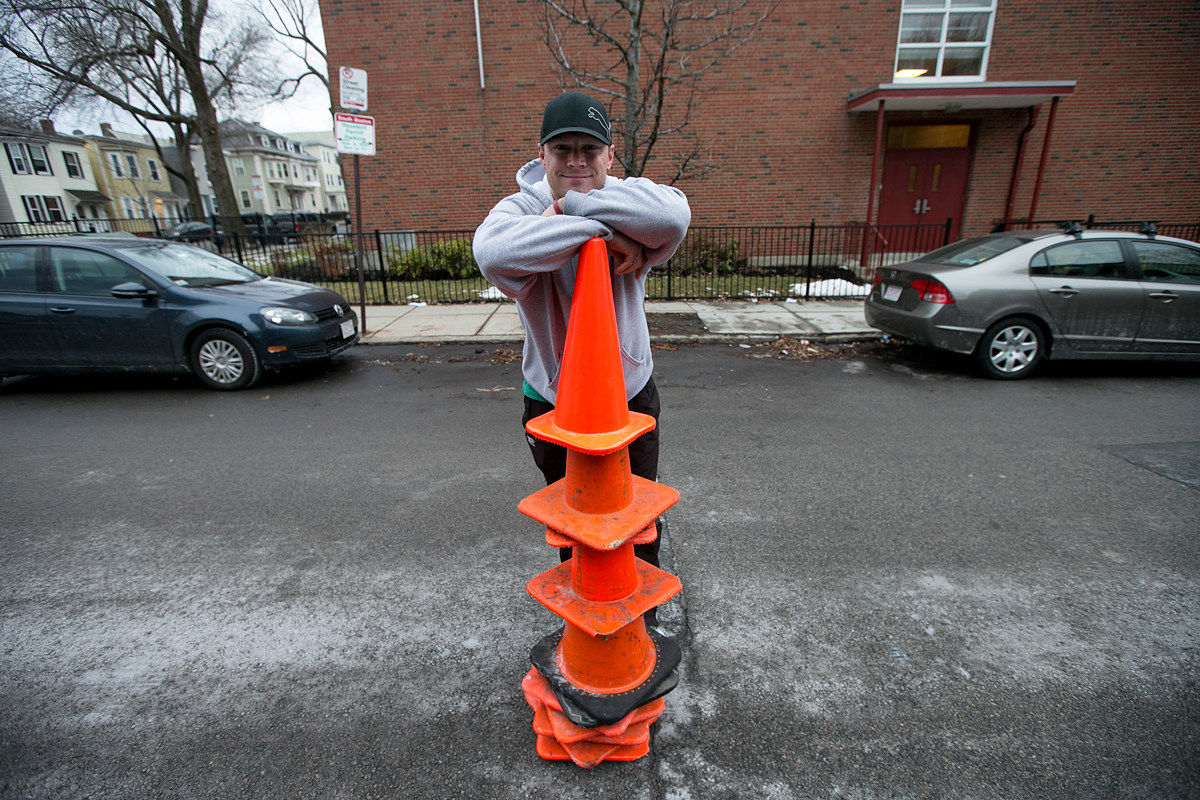 David Ivaska collected traffic cones on a 10-minute drive through South Boston during a light snowfall recently.