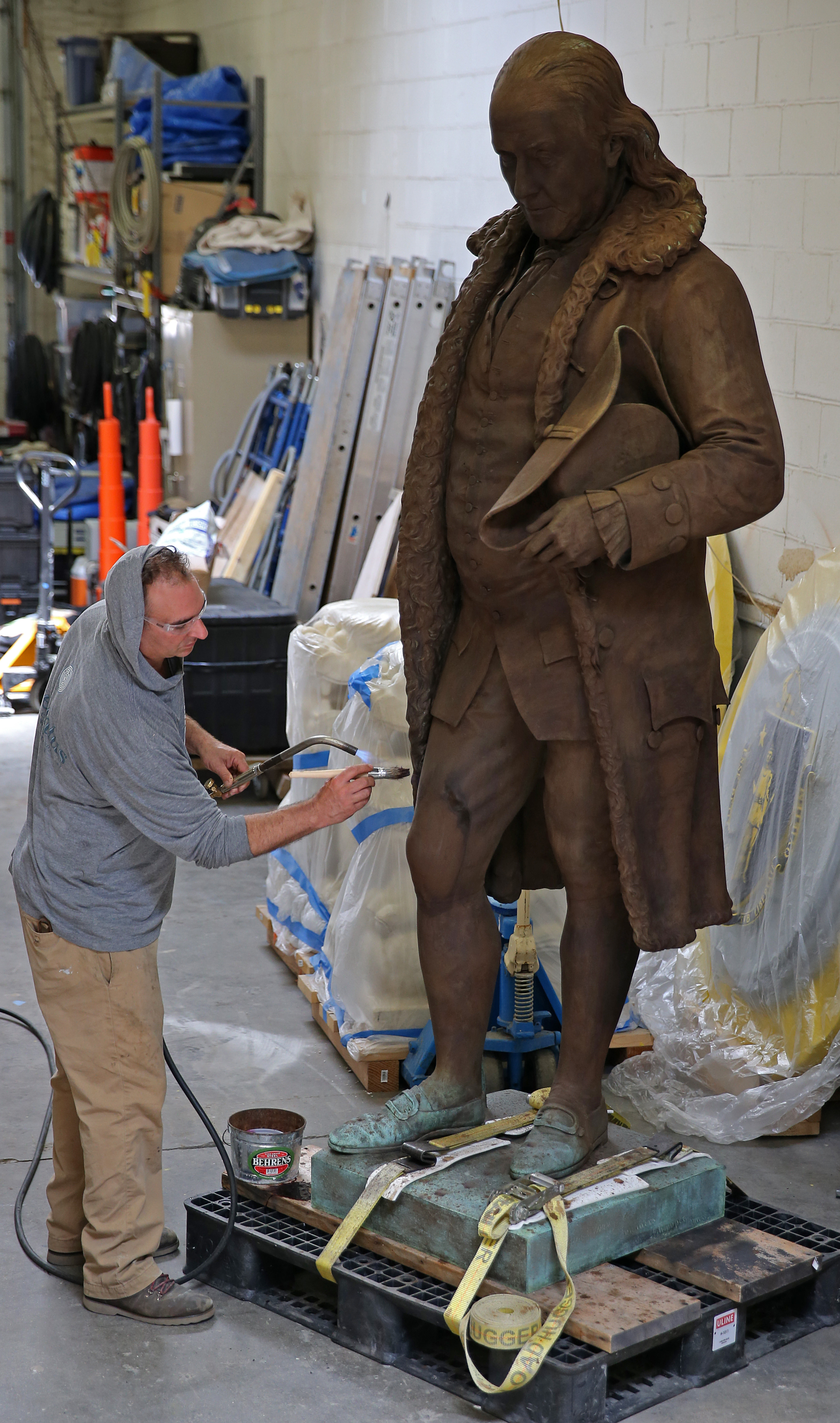 The statue blew over during heavy winds back in May.