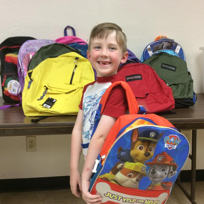 Brayden Collins sported his new backpack from this year’s Interfaith Social Services back-to-school donation drive.