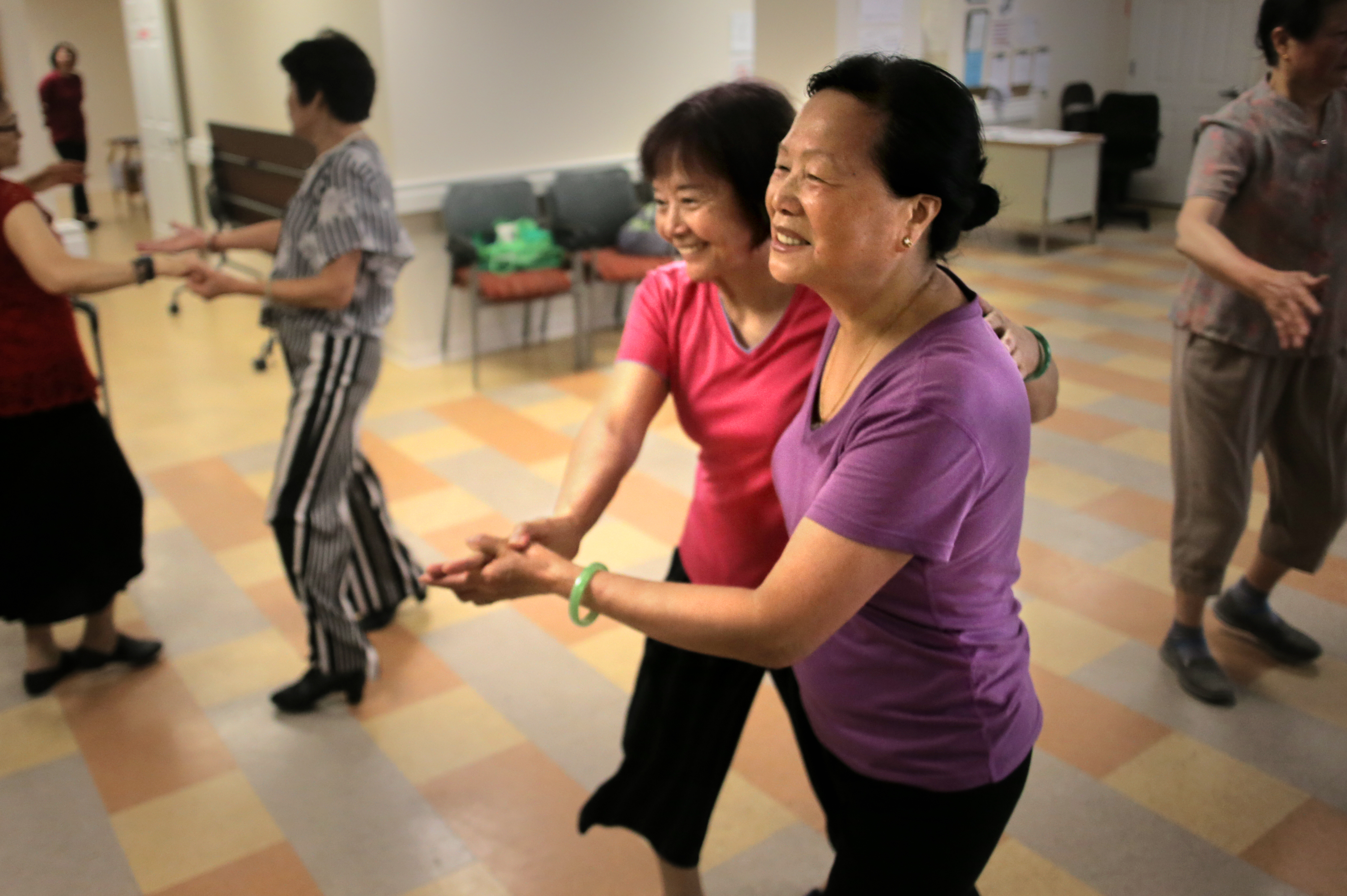 Meiho Kung and Weng Ngan Hum enjoyed a dance class at the Greater Boston Chinese Golden Age Center on Essex Street in Chinatown. About 30 women joined in for two hours of dance in several styles.