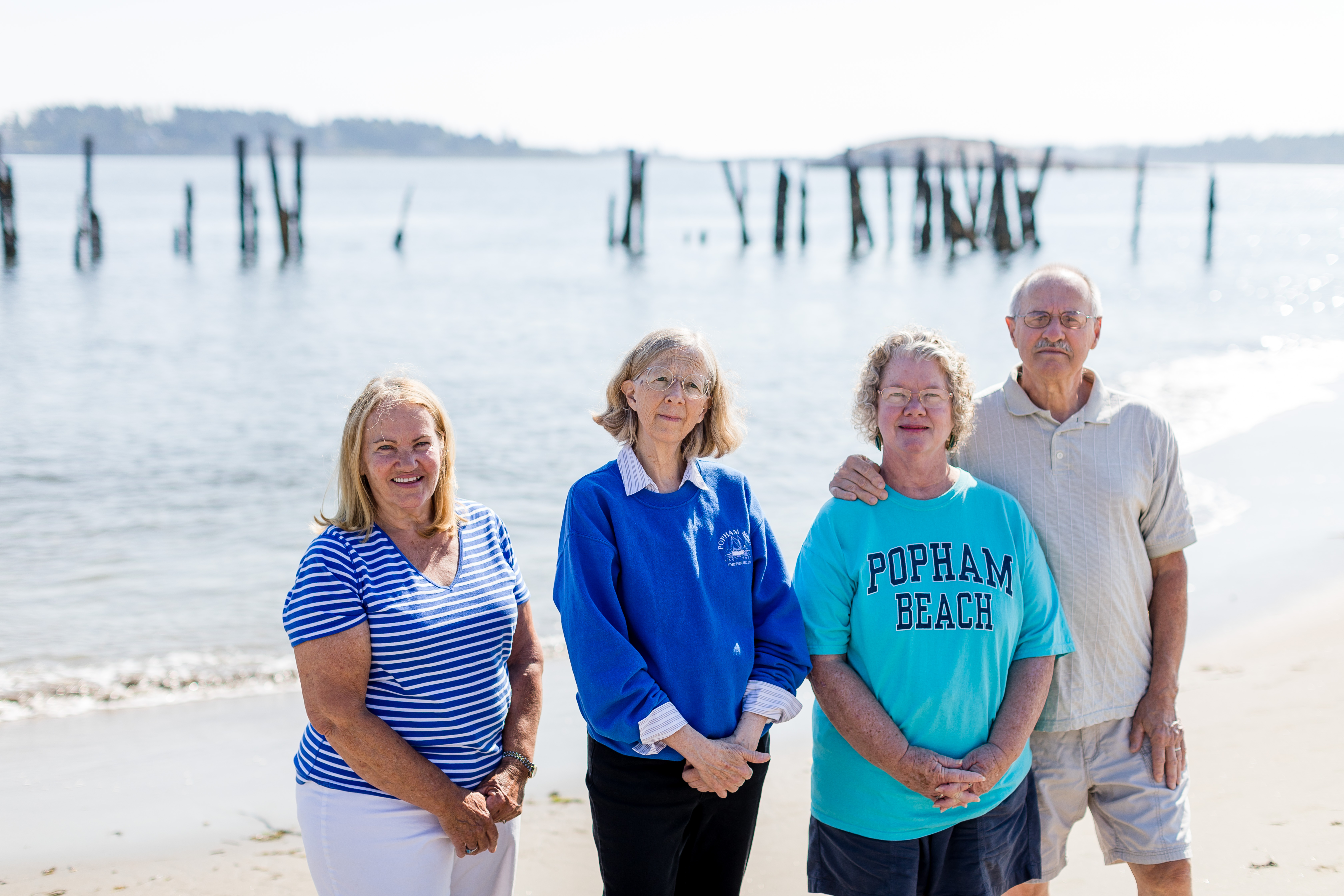 Some Phippsburg homeowners such as (from) Mary McNamara, Ellen Louise Hart, Jackie Gallo, and Jim Gallo want to preserve the remnants of the wharf.
