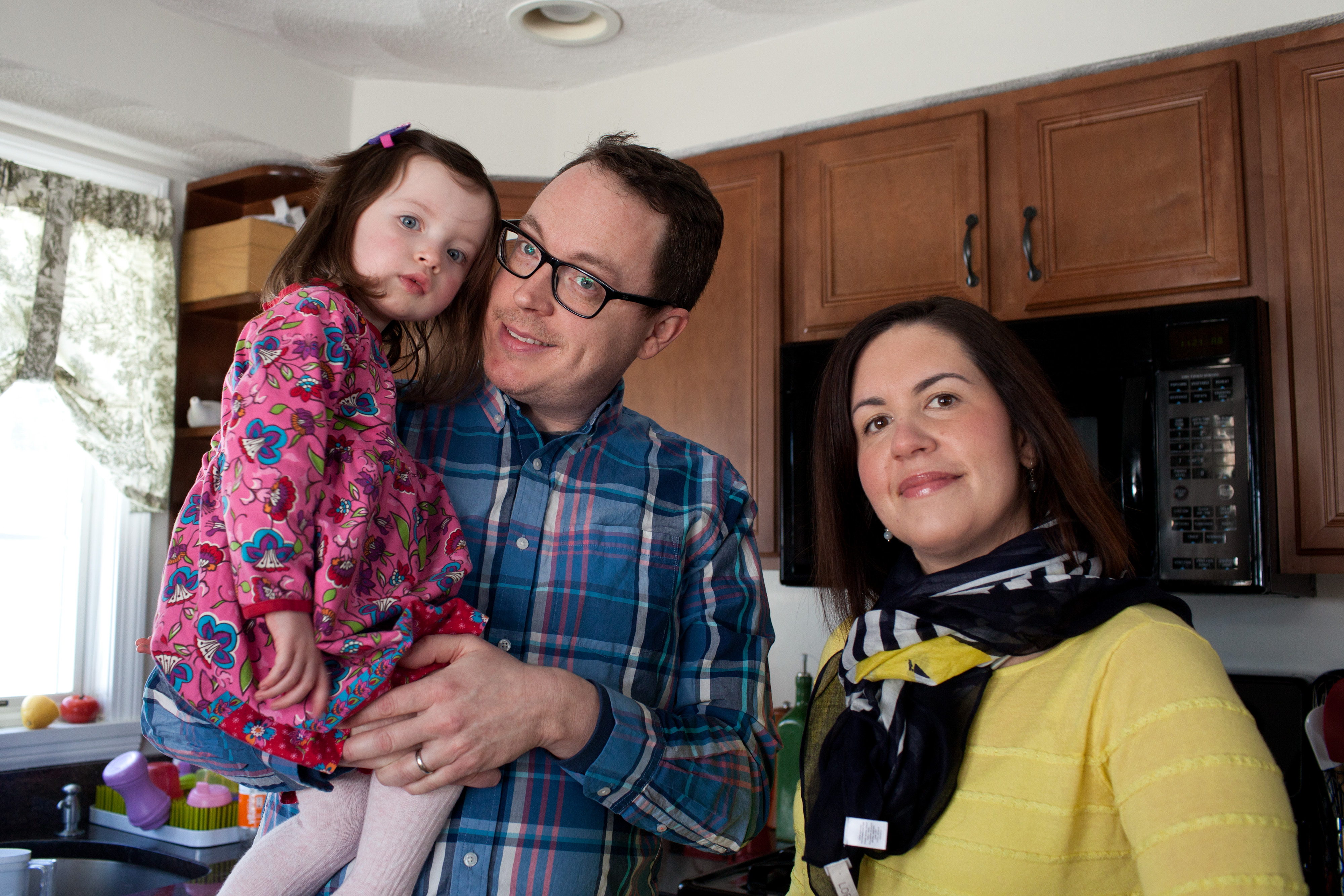 Jonathan Gouveia (center) with his family in their North Reading home.
