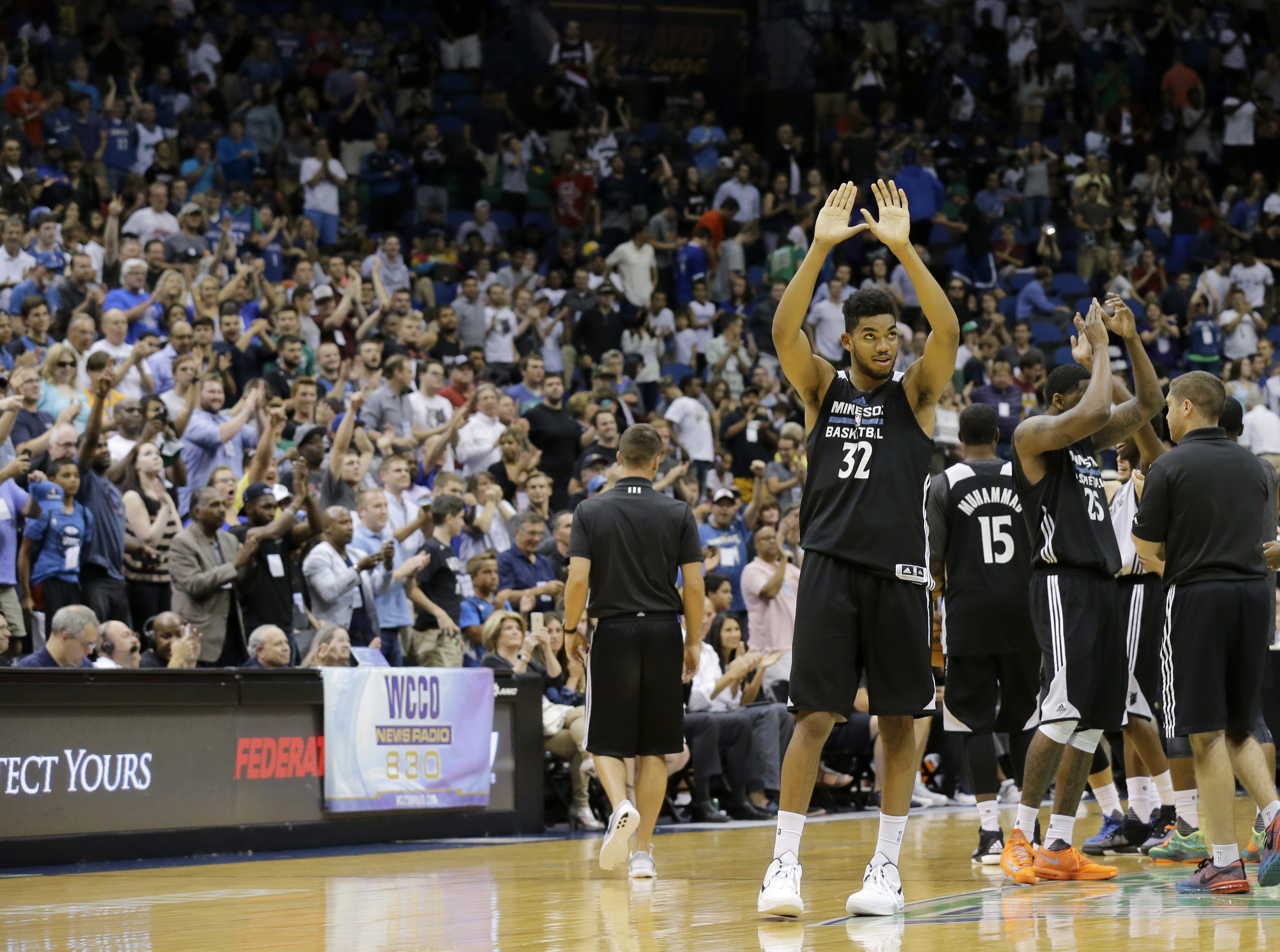 Karl-Anthony Towns (32) averaged 12.8 points and 7.2 rebounds in five summer league games.