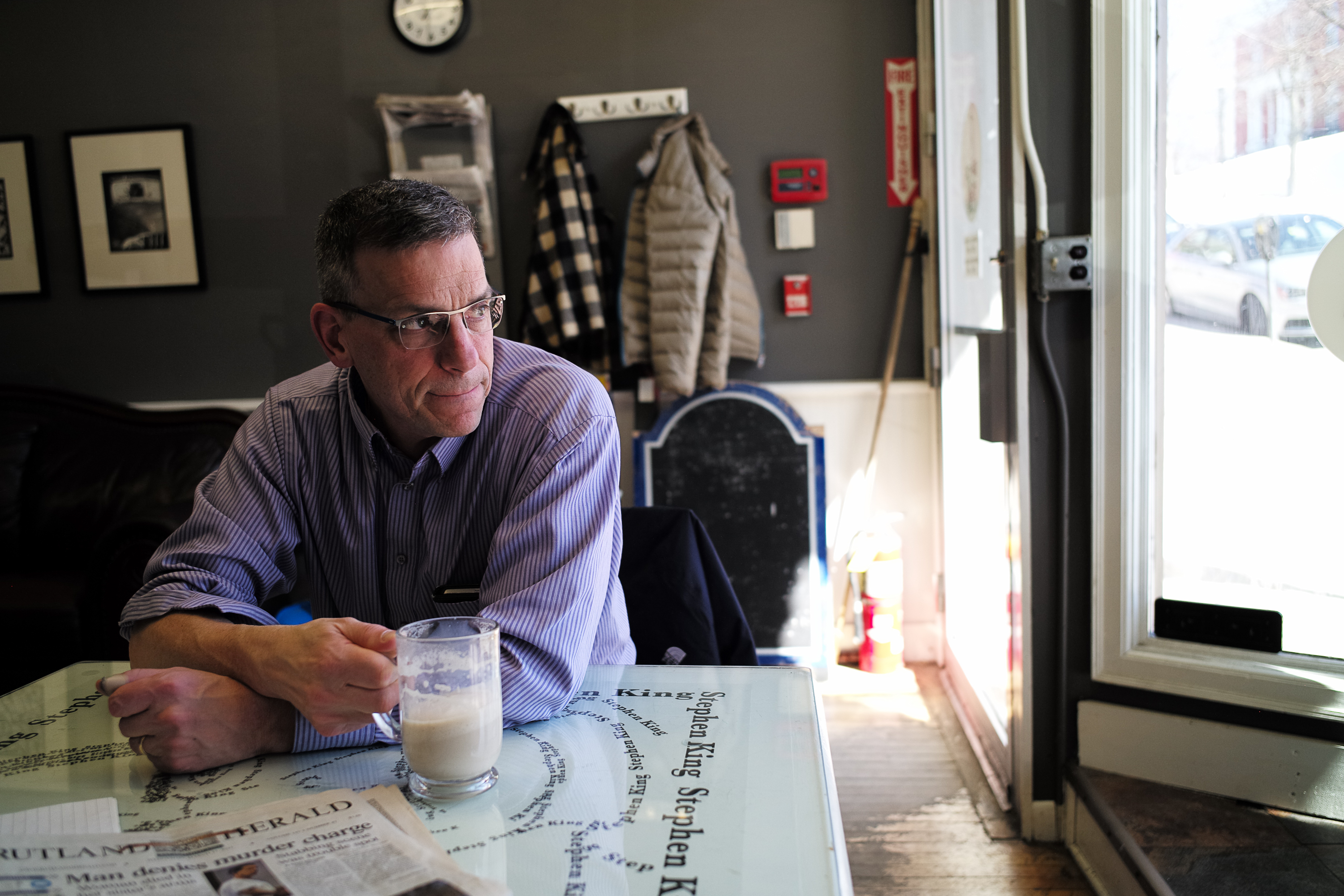 Chris Louras inside the Speak Easy Cafe in Rutland, Vt.